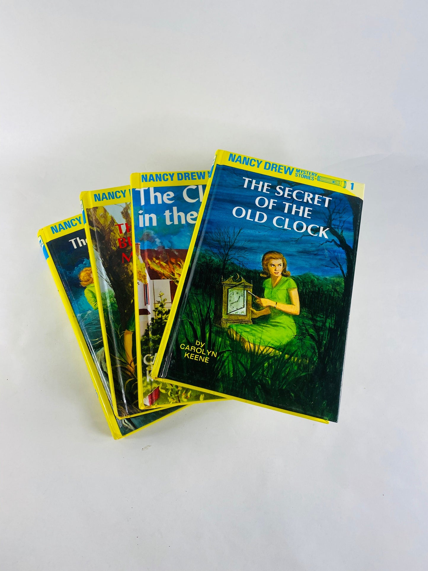 Nancy Drew Mystery Stories vintage books in good condition by Carolyn Keene. Glossy yellow spine hardcovers. home reading elementary middle