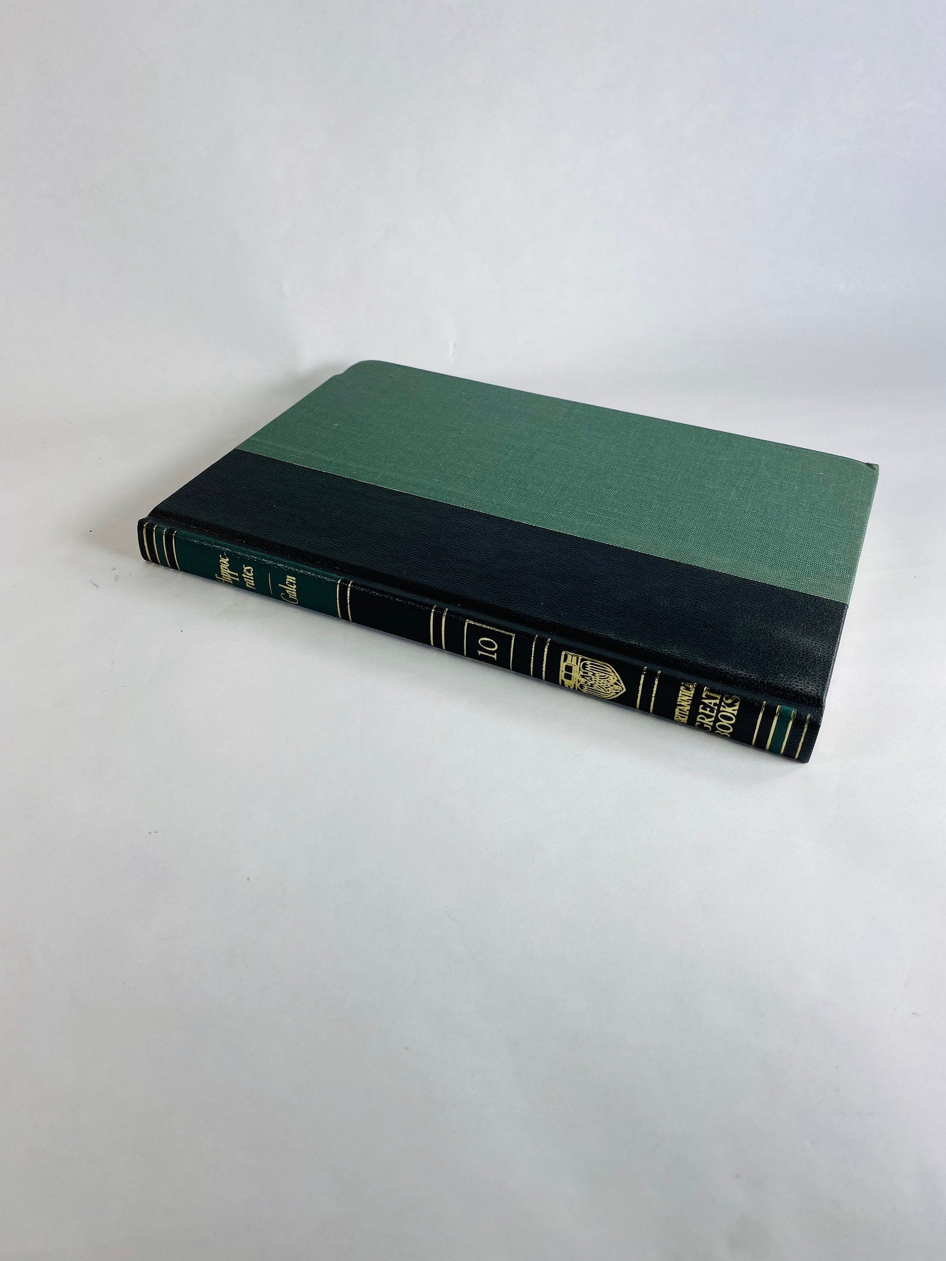 Emerald green & black vintage books Darwin Galileo Hippocrates Euclid Archimedes Newton Britannica Great Books Staging bookshelf decor 1986