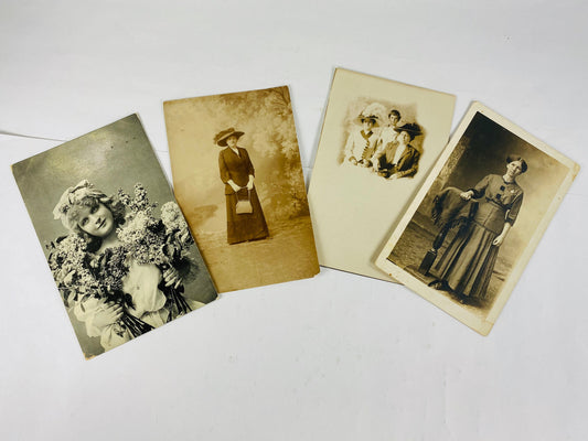 1908 vintage RPPC women postcard B&W stamped. BEAUTIFUL home office decor for framing. Flowers, Dress with hat and purse, family, standing