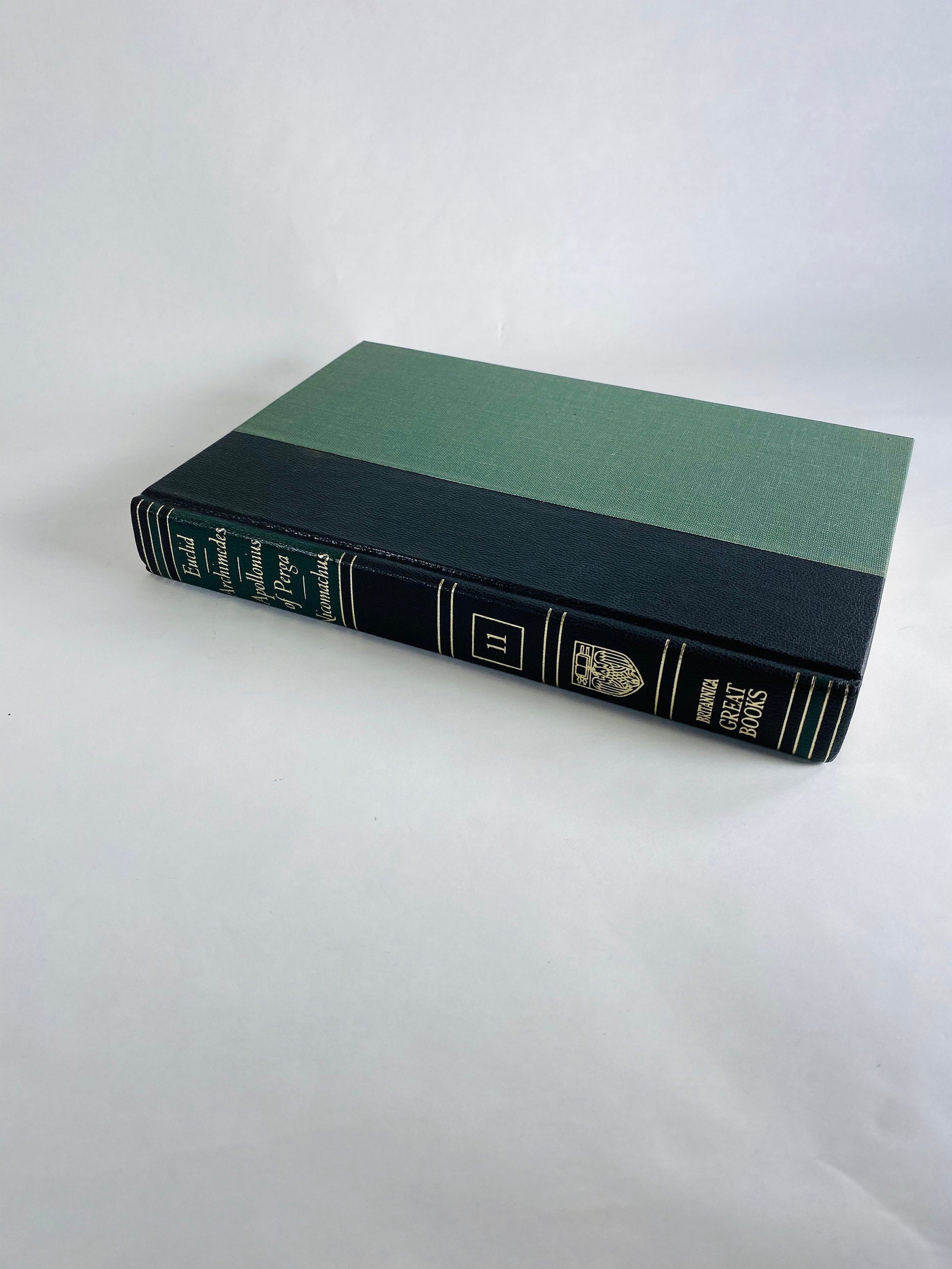 Emerald green & black vintage books Darwin Galileo Hippocrates Euclid Archimedes Newton Britannica Great Books Staging bookshelf decor 1986