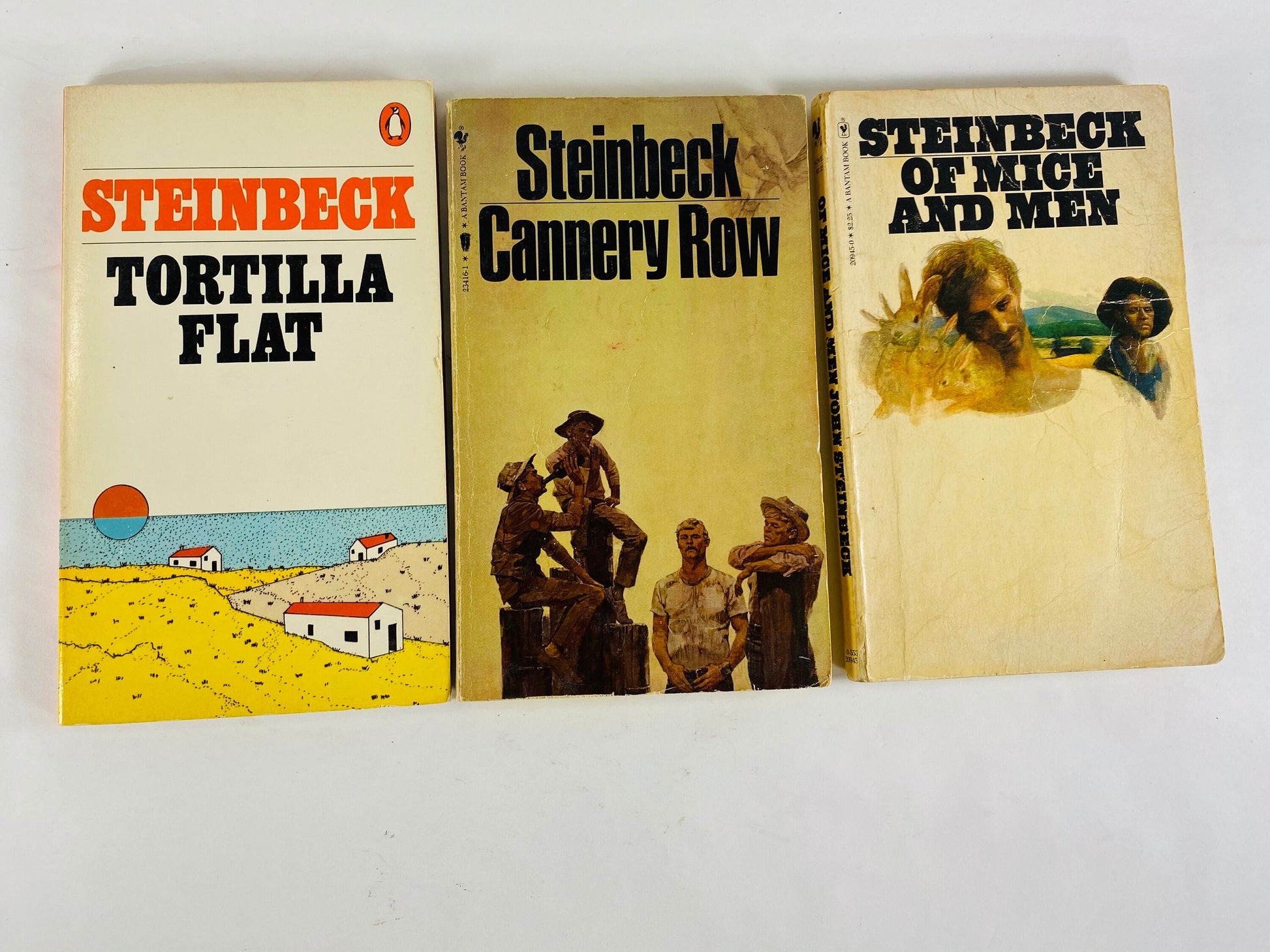 John Steinbeck Of Mice & Men, Cannery Row, Tortilla Flat Vintage paperback book Penguin Bantam. At home reading. Christmas stocking stuffer