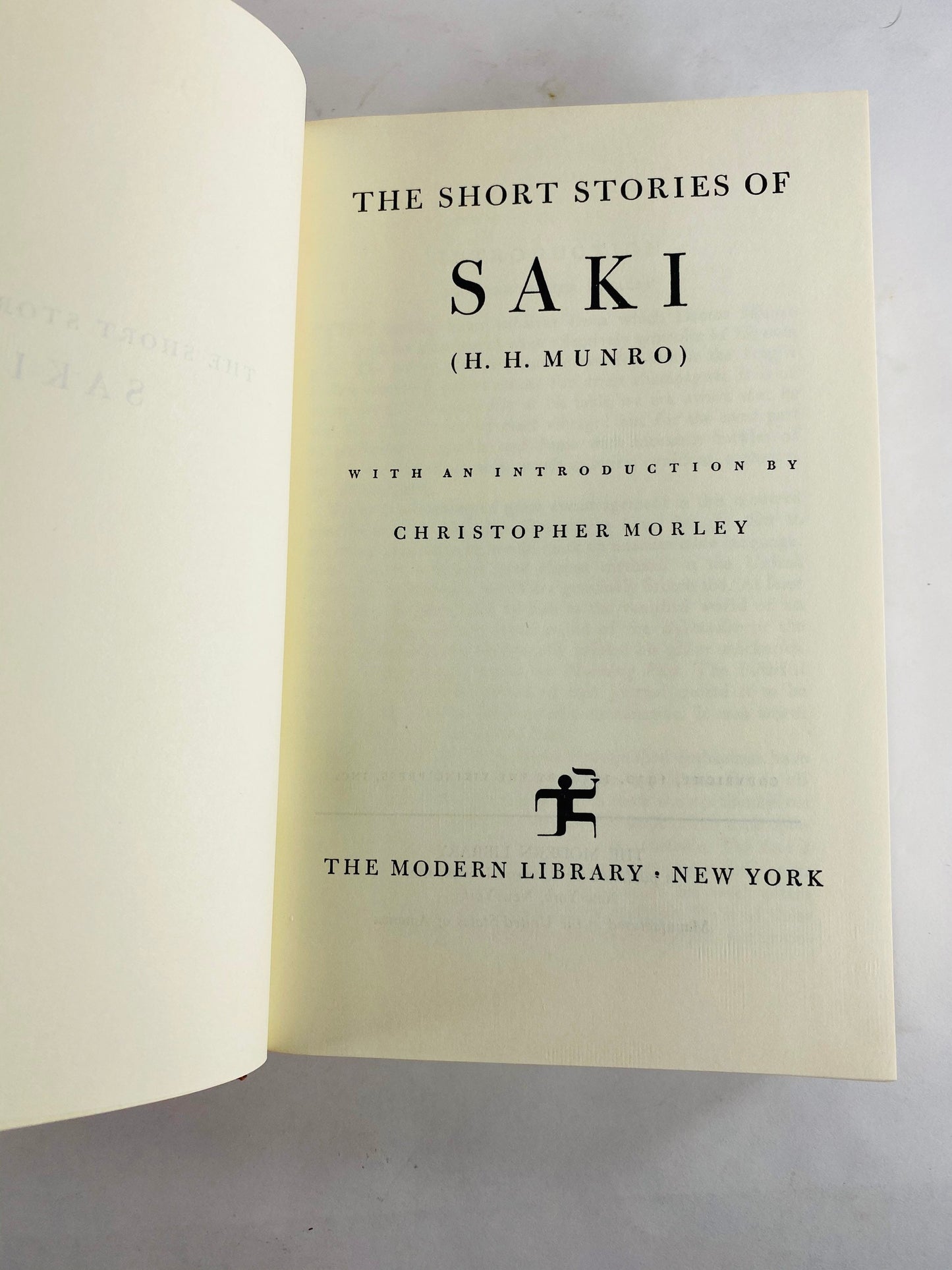 Short Stories of Saki Modern Library book circa 1958 HM Munro. Viking Press. Master of the short story. Parody. Red bookshelf decor