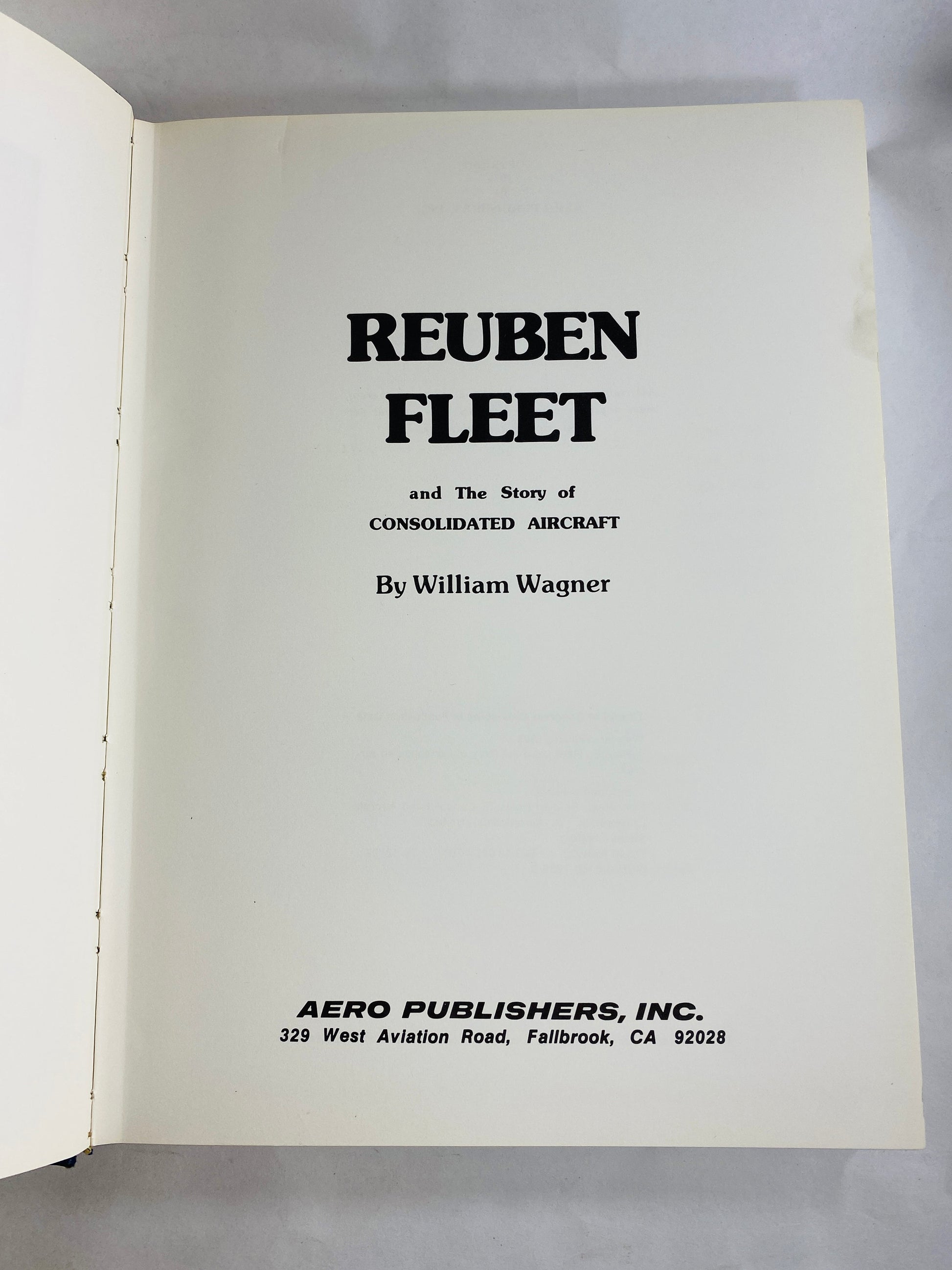 Reuben Fleet vintage coffee table by Wagner 1976 Consolidated planes subsidiaries & predecessors. Large blue bookshelf decor airplane flight