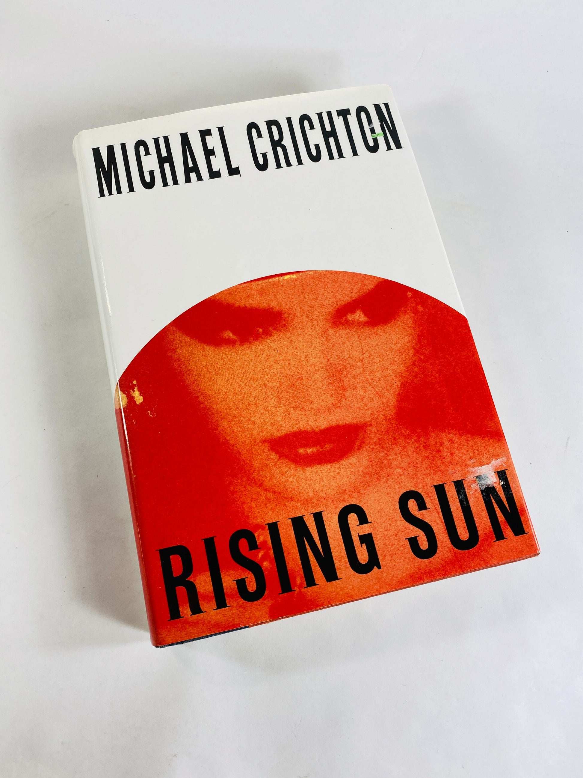 Rising Sun by Michael Crichton vintage book circa 1992 set in Japan where business moguls compete for control of the electronics industry.