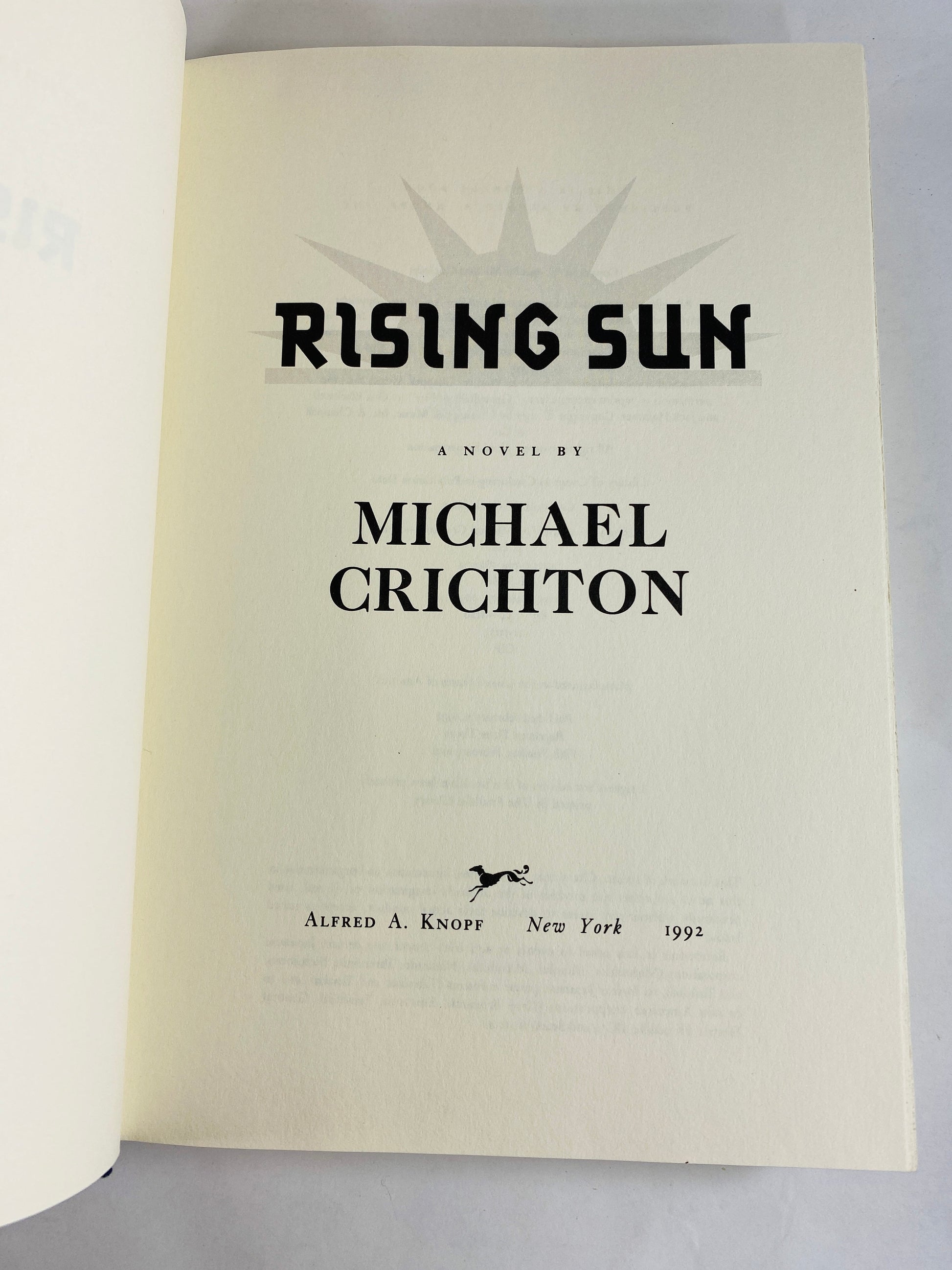 Rising Sun by Michael Crichton vintage book circa 1992 set in Japan where business moguls compete for control of the electronics industry.