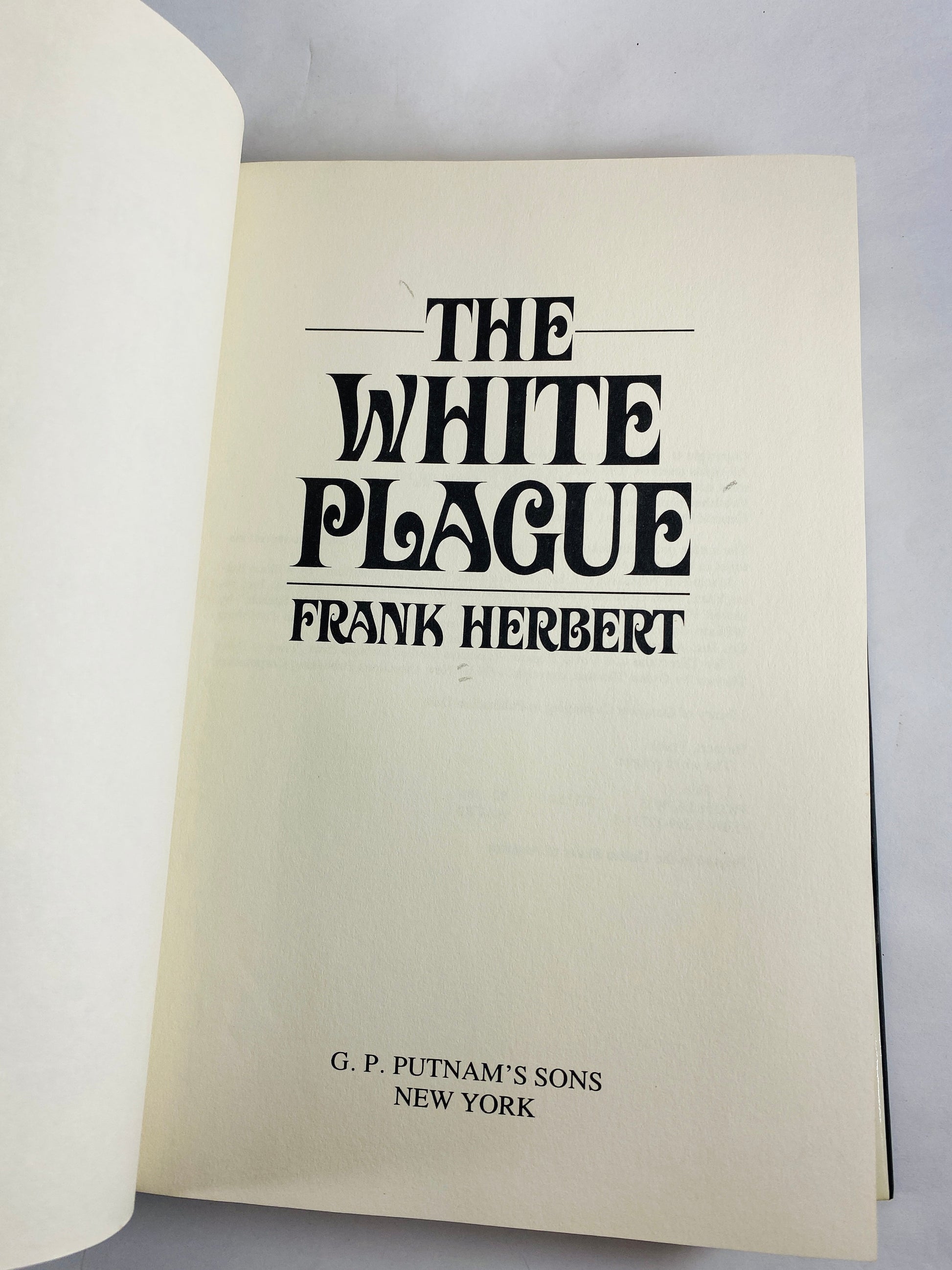 White Plague Vintage book by Frank Herbert author of Dune circa 1982. Madman unleashes a terrible plague upon the human race.