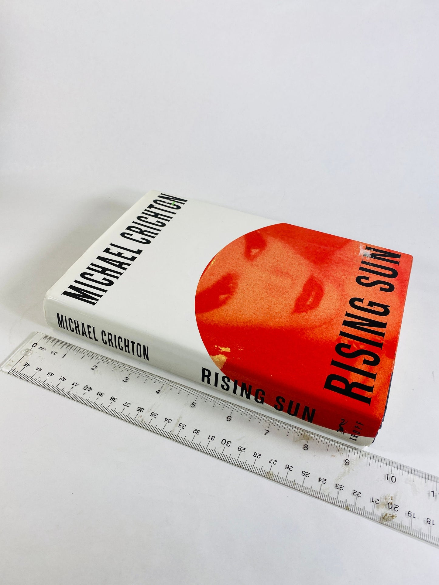 Rising Sun by Michael Crichton vintage book circa 1992 set in Japan where business moguls compete for control of the electronics industry.
