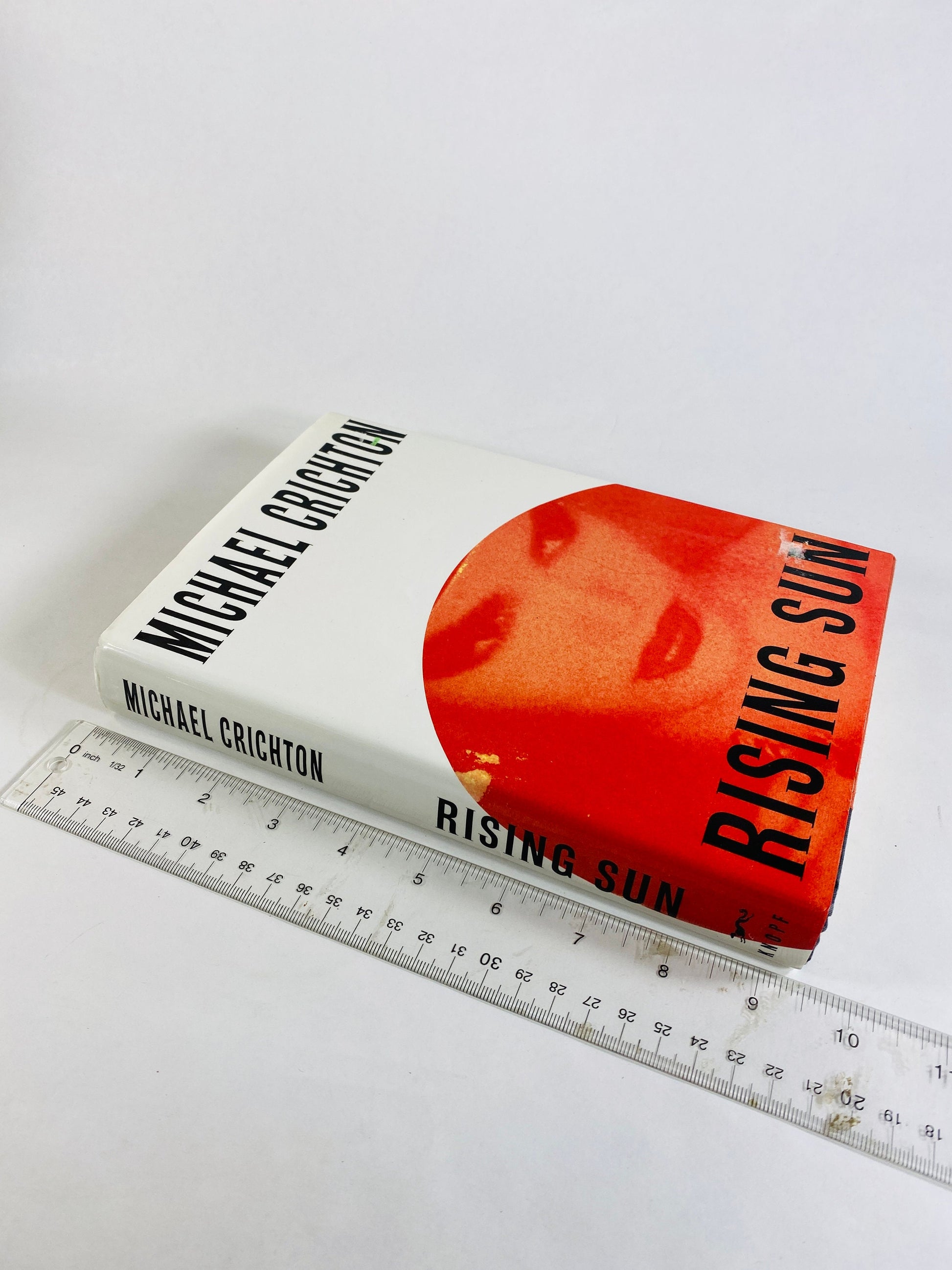 Rising Sun by Michael Crichton vintage book circa 1992 set in Japan where business moguls compete for control of the electronics industry.