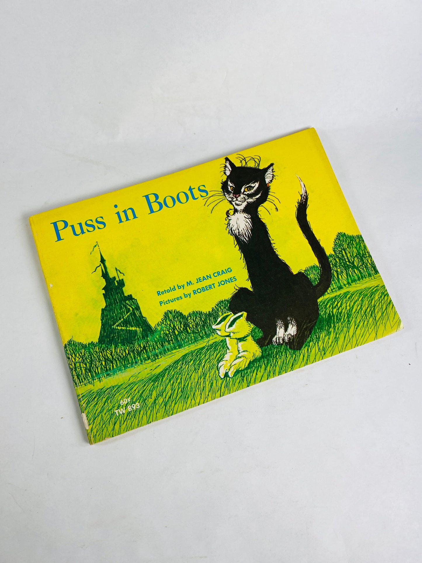 Puss in Boots circa 1972 Vintage children's book by M Jean Craig Scholastic paperback book Robert Jones illustrations.