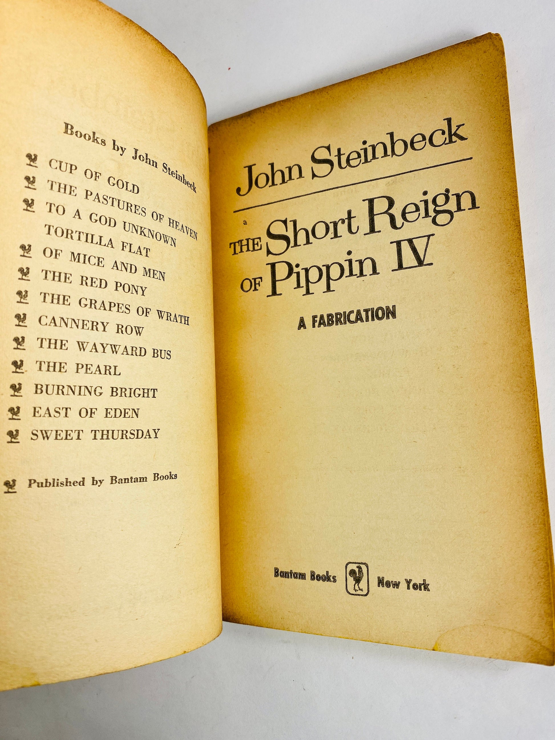 Short Reign of Pippin IV vintage paperback book by John Steinbeck circa 1957 about a man who didn't want to be king