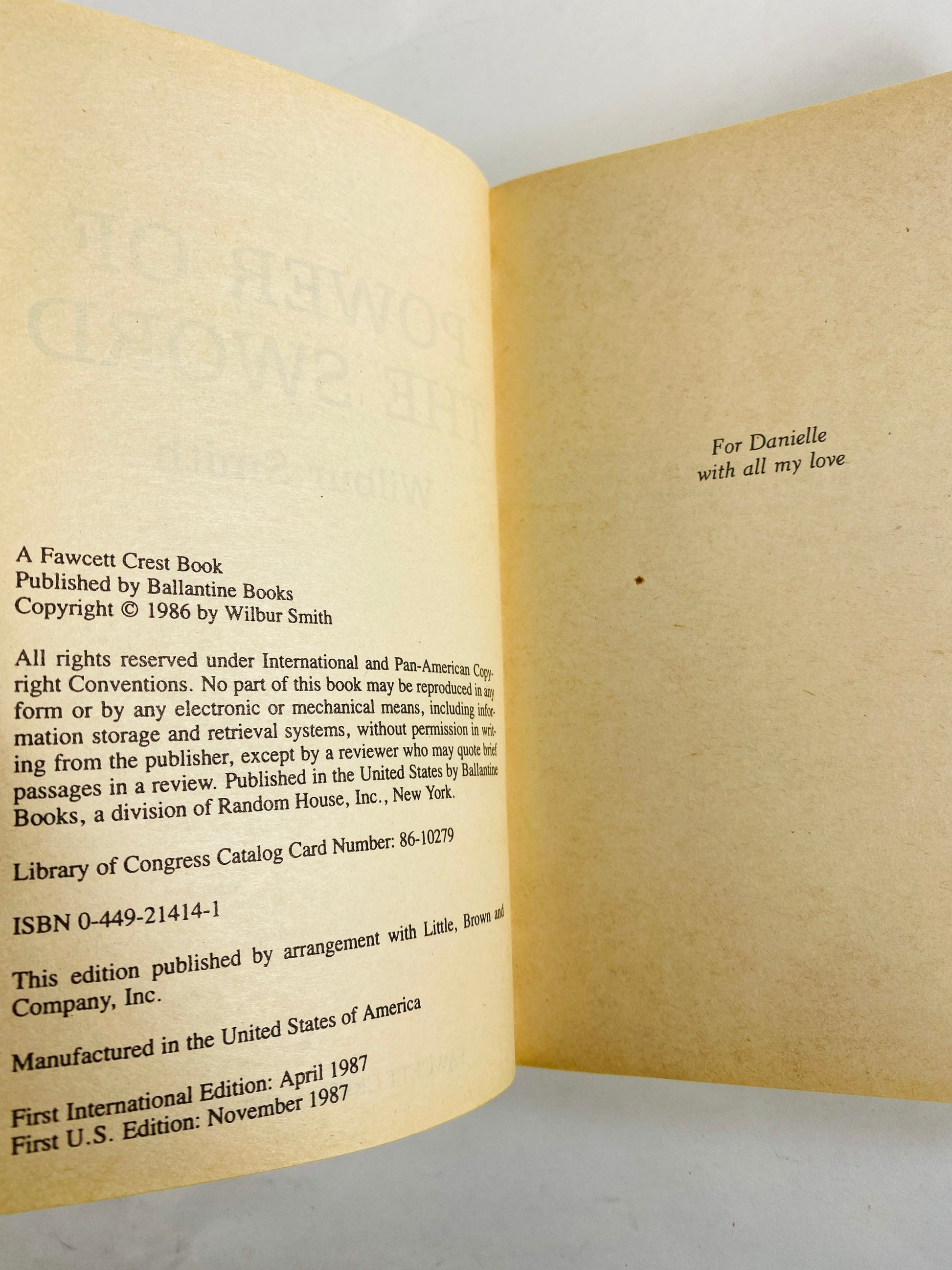 1987 Power of the Sword Vintage paperback Book war novel by Wilbur Smith military combat paperback book about World War II.