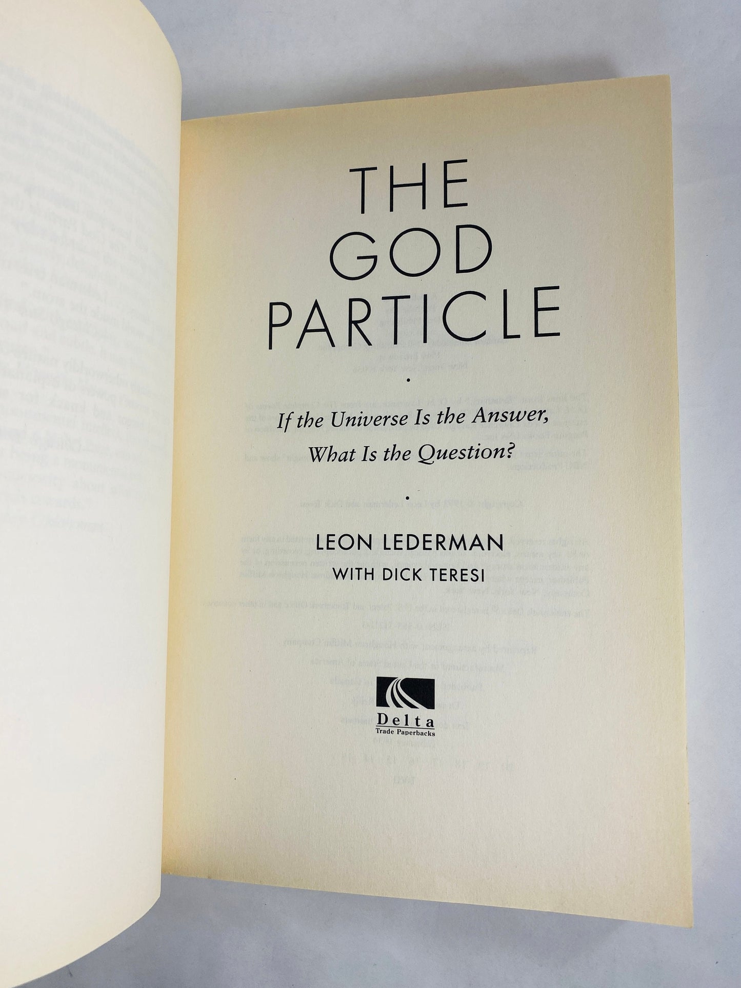 God Particle vintage paperback book by Leon Lederman circa 1994 about the eureka moments that brought us the secrets of the universe Science
