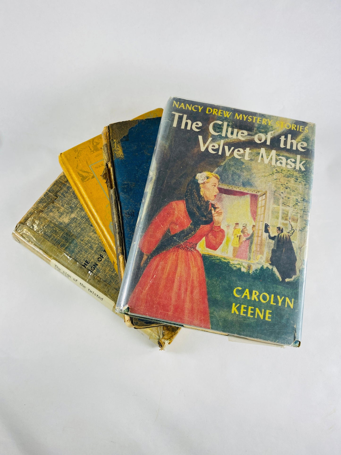 Vintage Nancy Drew Mystery books Carolyn Keene silhouette endpapers Twisted Candles Leaning Chminey Velvet Mask Former LIBRARY books