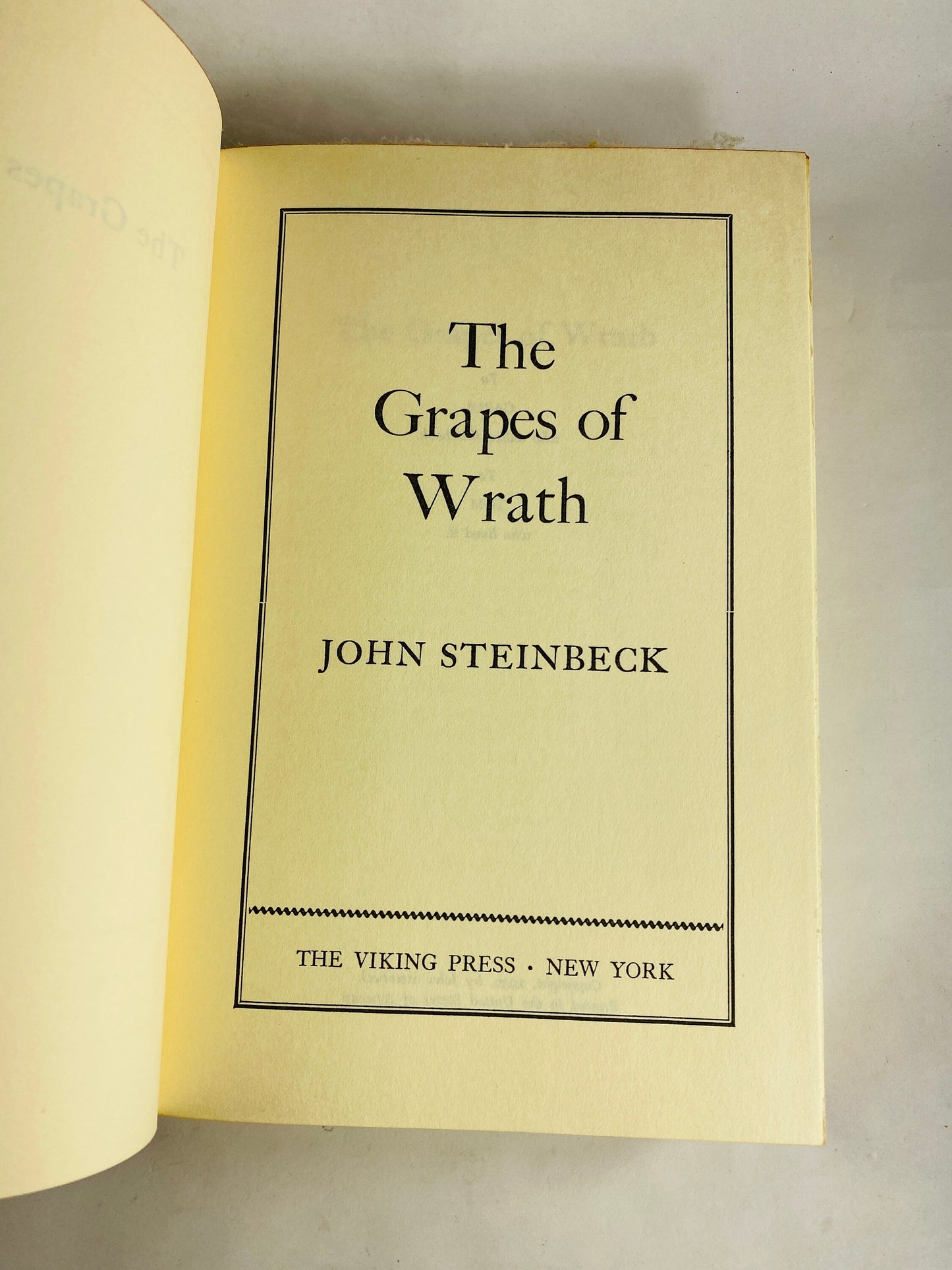 Grapes of Wrath vintage book by John Steinbeck EARLY PRINTING circa 1967 Viking Press BCE with dust jacket. Collector bookshelf gift