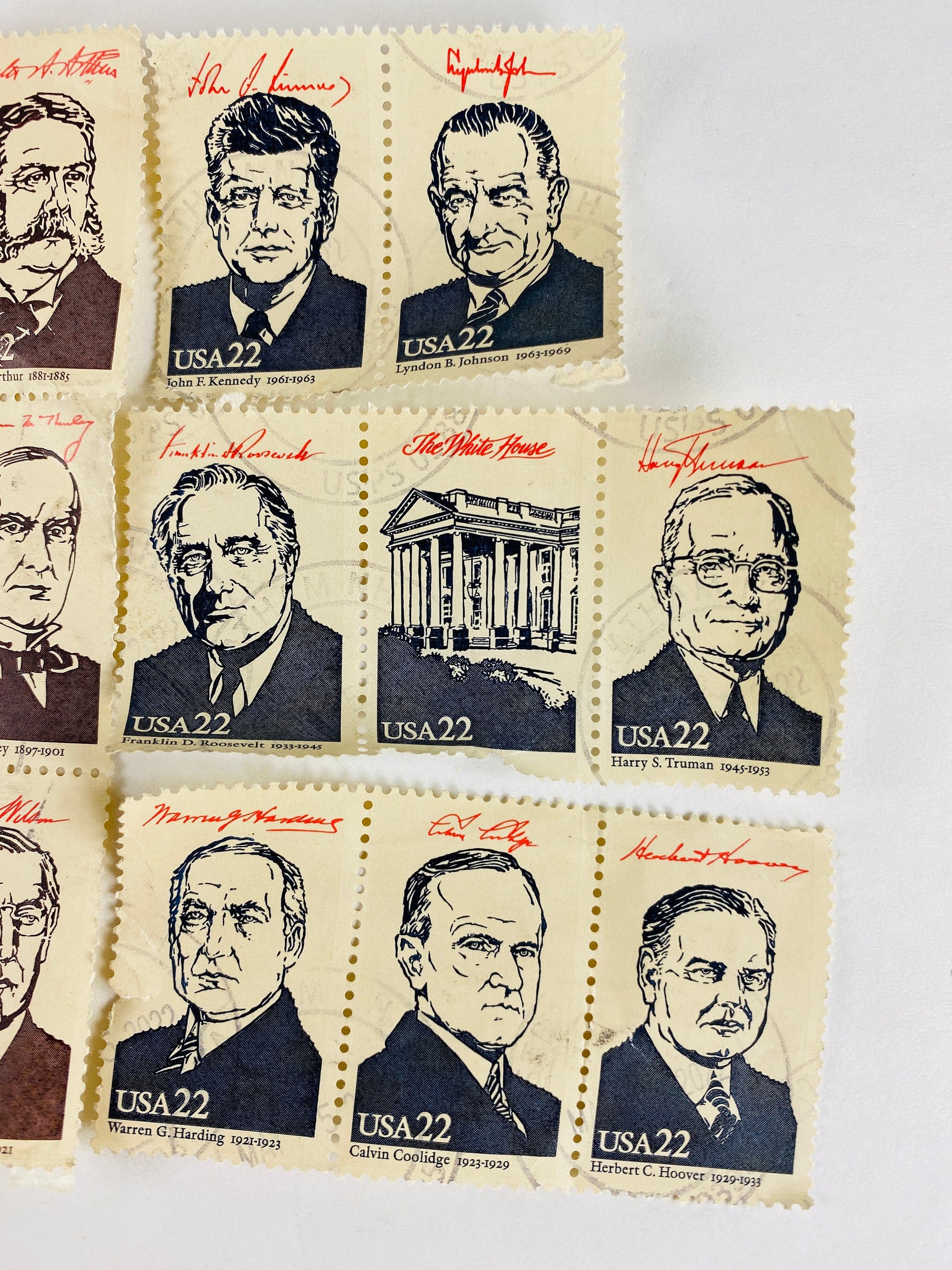 Lot of 17 commemorative stamps depicting a US President and the White House circa 1986 USED postage