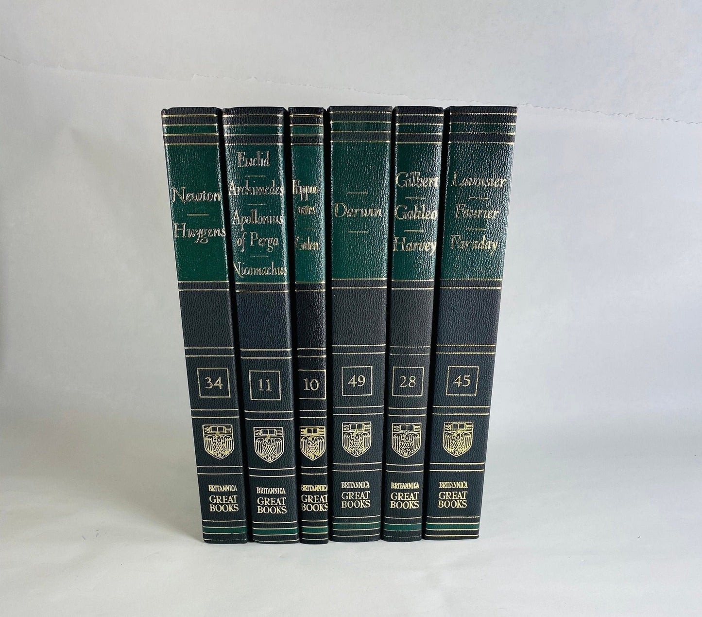 Emerald green & black vintage books Darwin Galileo Hippocrates Euclid Archimedes Newton Britannica Great Books Staging bookshelf decor 1986