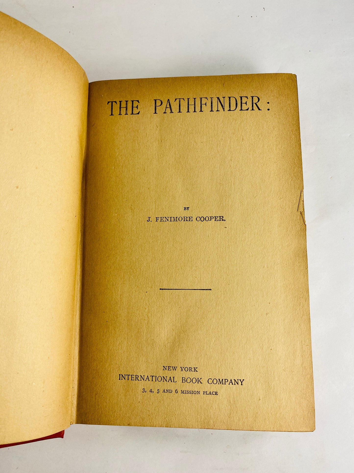 Pathfinder and the Prarie by James Fenimore Cooper circa 1900 red vintage book with gold embossing The New Columbus Series