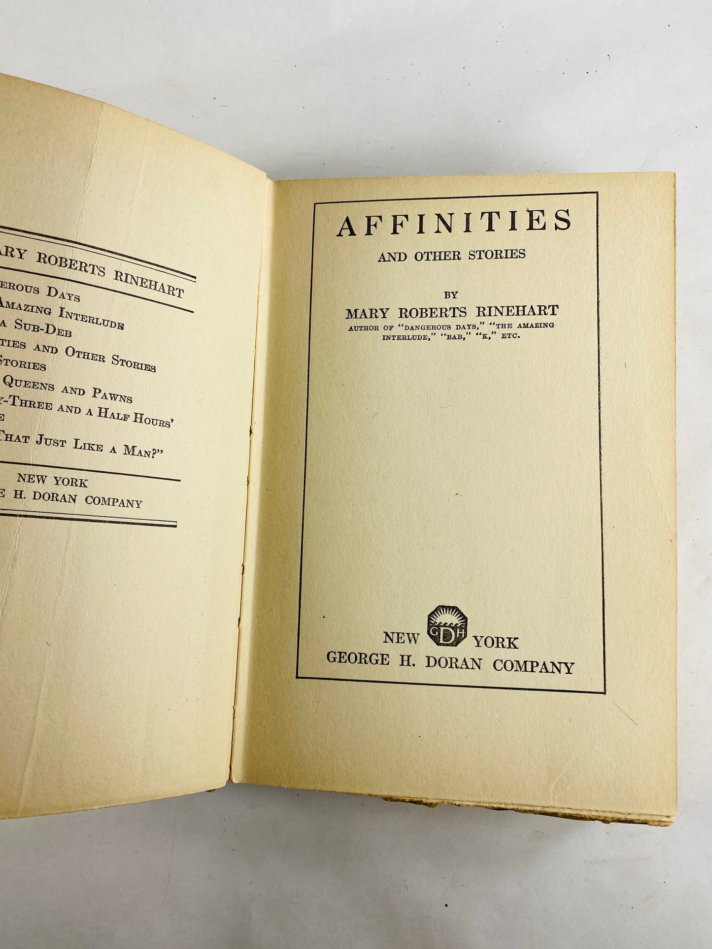 1920 Affinities by Mary Roberts Rinehart. Antique crime book by the American Agatha Christie! Blue vintage home bookshelf decor. Mystery