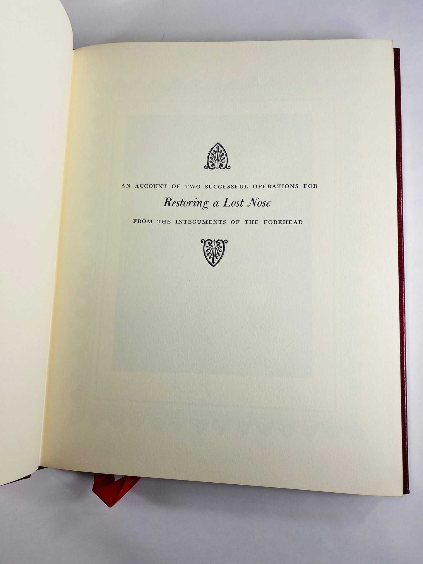 Two Successful Operations for Restoring a Lost Nose vintage medical book by Carpue GORGEOUS red embossed leather Medicine Physician Doctor