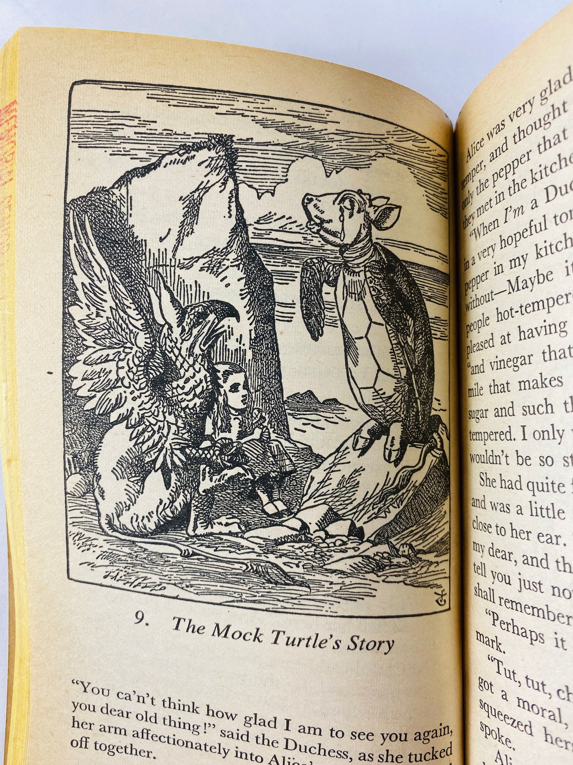 1968 Alice's Adventures in Wonderland & Through the Looking Glass Vintage paperback book by Lewis Carroll.
