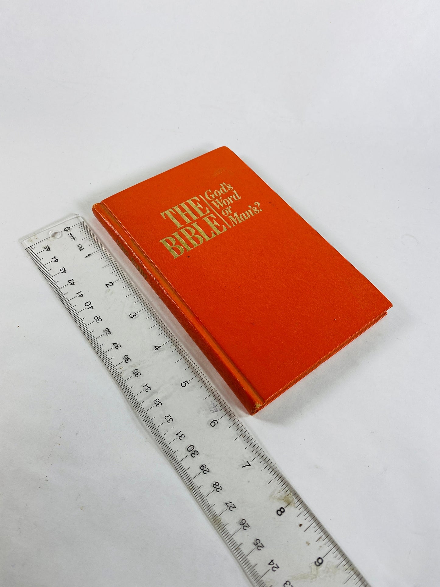 Bible vintage book God's Word or Man's small orange hardback book circa 1989 Provides textual content for studying the Scripture's subjects.