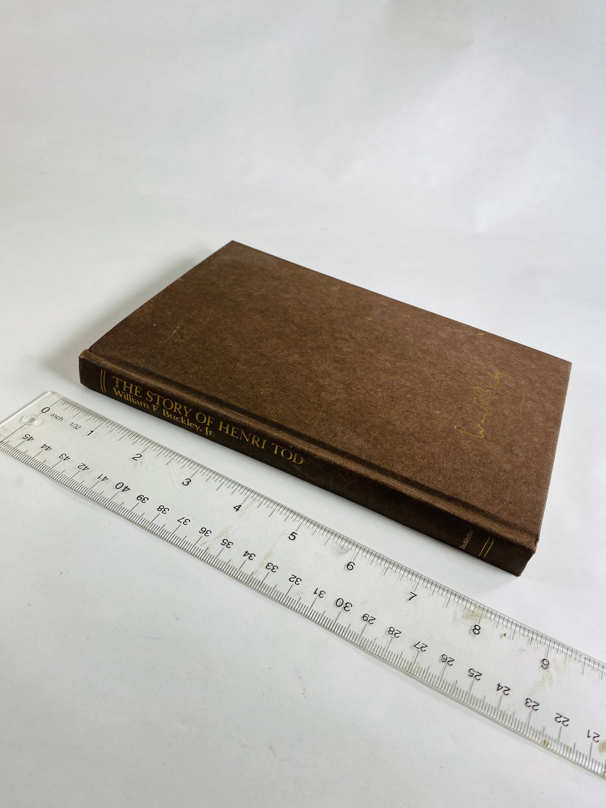 Story of Henri Tod by William F Buckley vintage book circa 1984 set in East Germany. Brown bookshelf decor