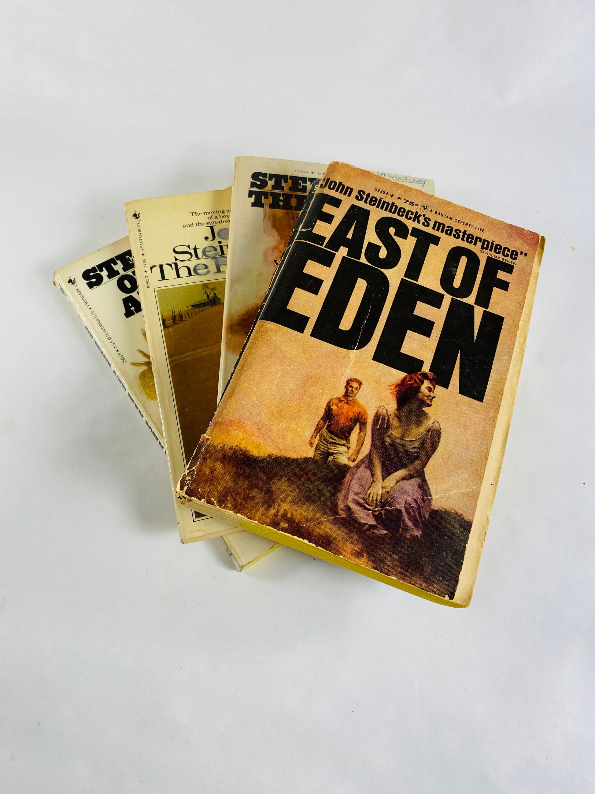 John Steinbeck East of Eden Red Horse Pearl vintage paperback book Of Mice and Men Pulitzer Prize Bantum circa 1980s