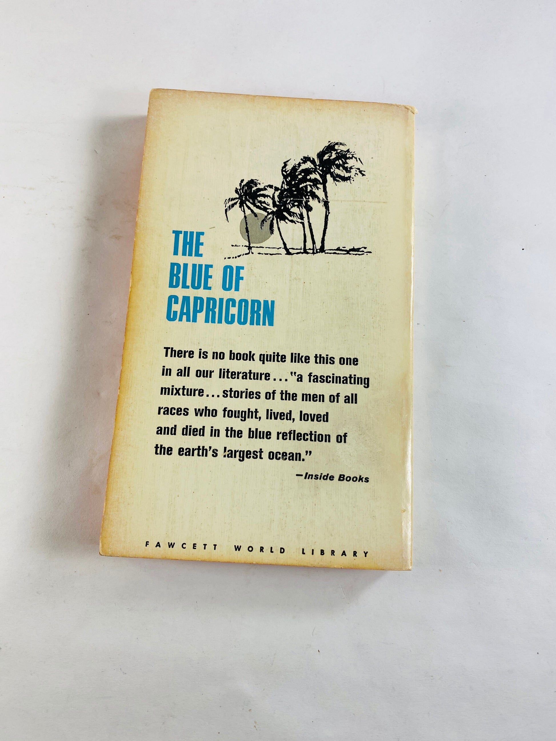 Blue of Capricorn vintage paperback book by Eugene Burdick circa 1961 stories of men of all races who fought and loved in ocean's reflection