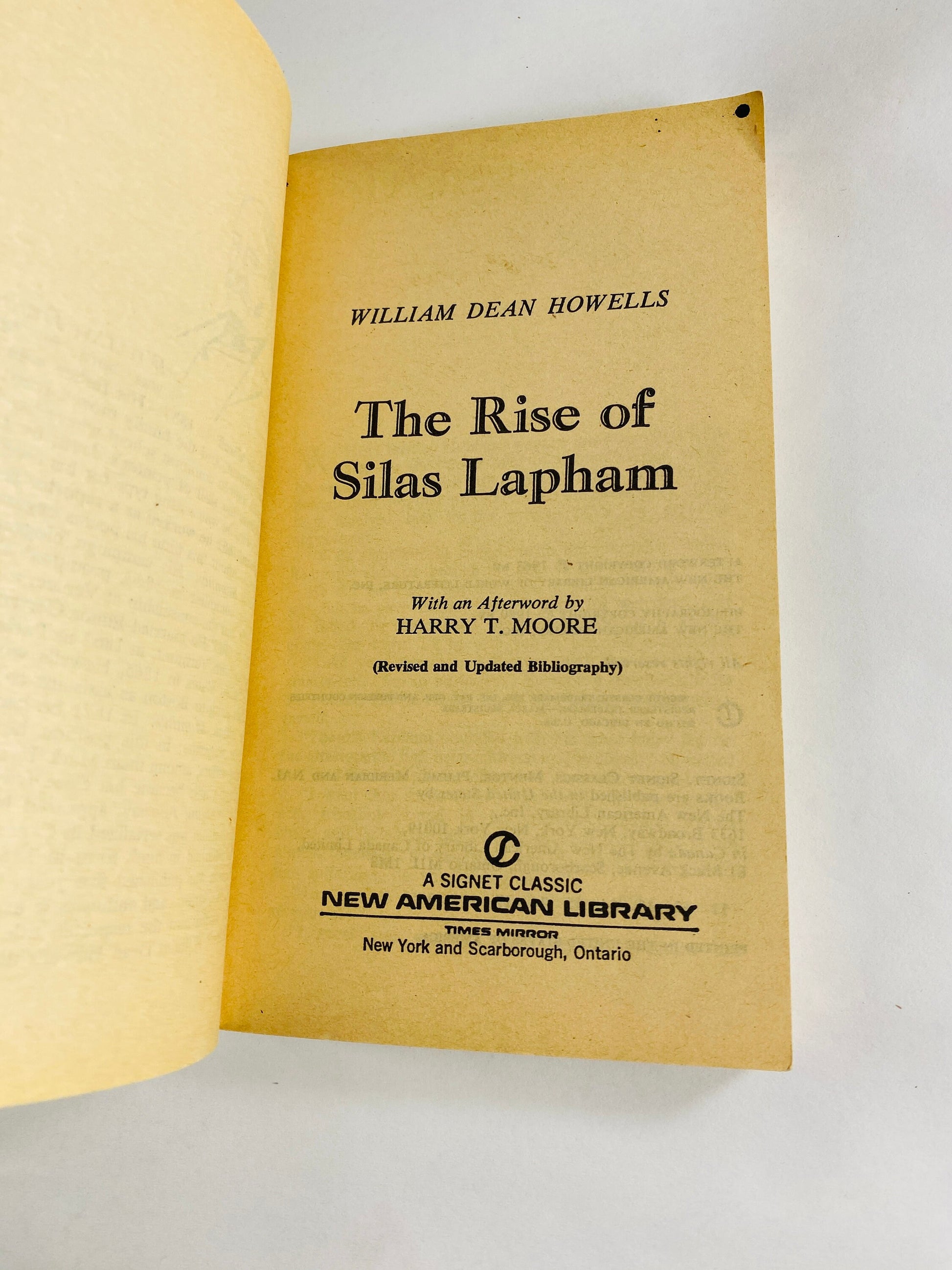 Rise of Silas Lapham by William Howells Vintage Signet paperback book about a self-made millionaire in Boston during the Gilded Age