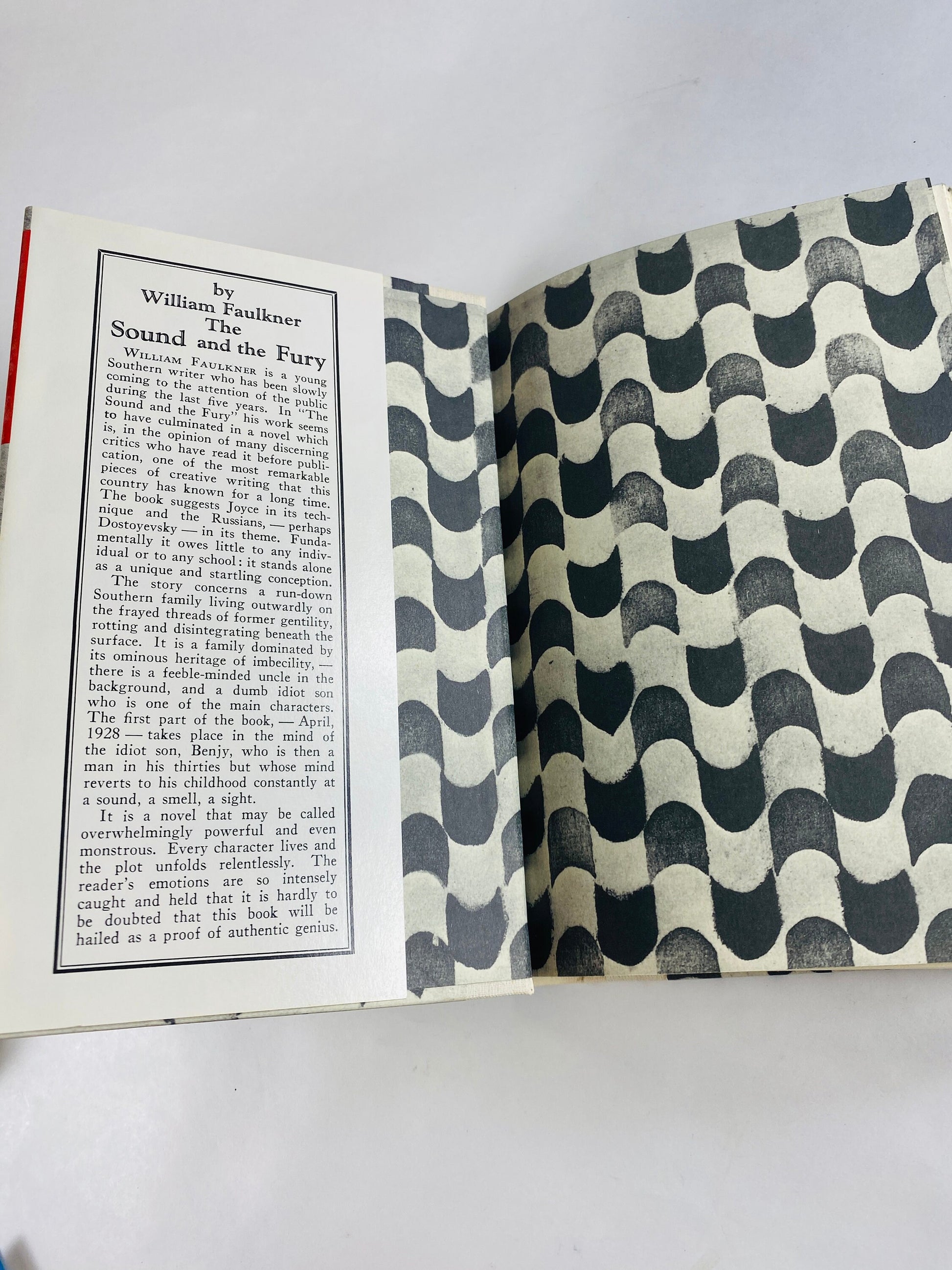 Sound and the Fury vintage book by William Faulkner Tragedy set in Mississippi about former Southern aristocrats and loss of reputation 1984