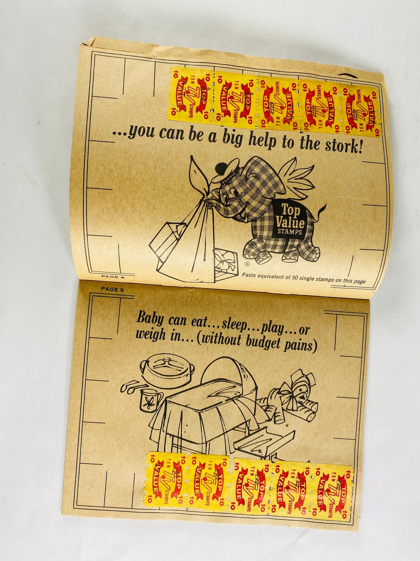 Authentic Top Value Green Stamps Saver booklet with pasted stamps by Top Saver circa 1966. Grocery Store coupons 1960s prop staging decor