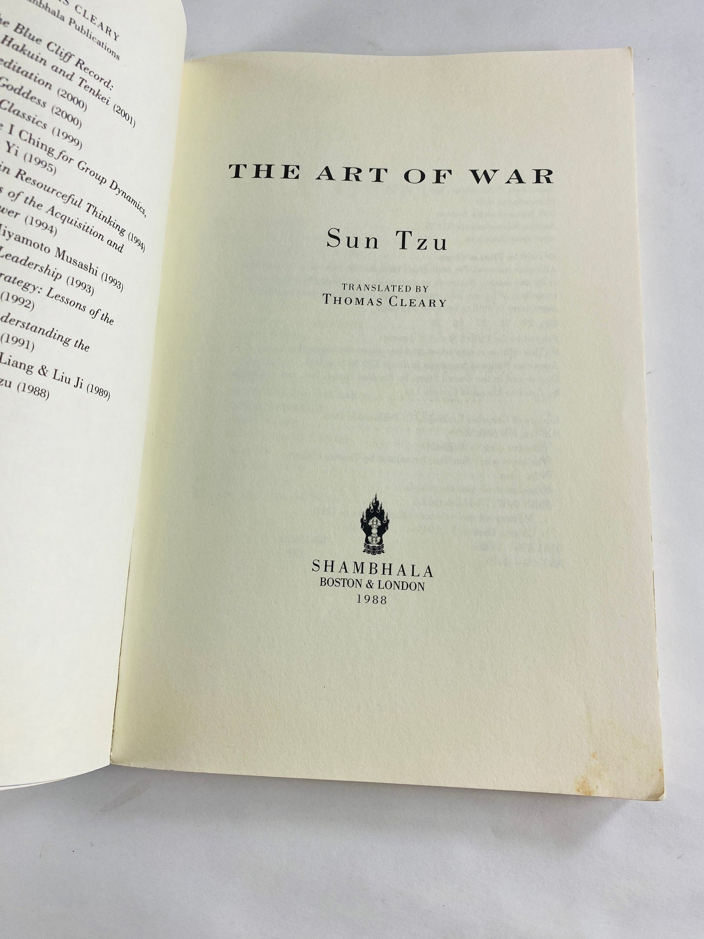 Art of War by Sun Tzu Vintage psperback book of the ancient Chinese military treatise by Master Sun Sunzi Black bookshelf decor Philosophy