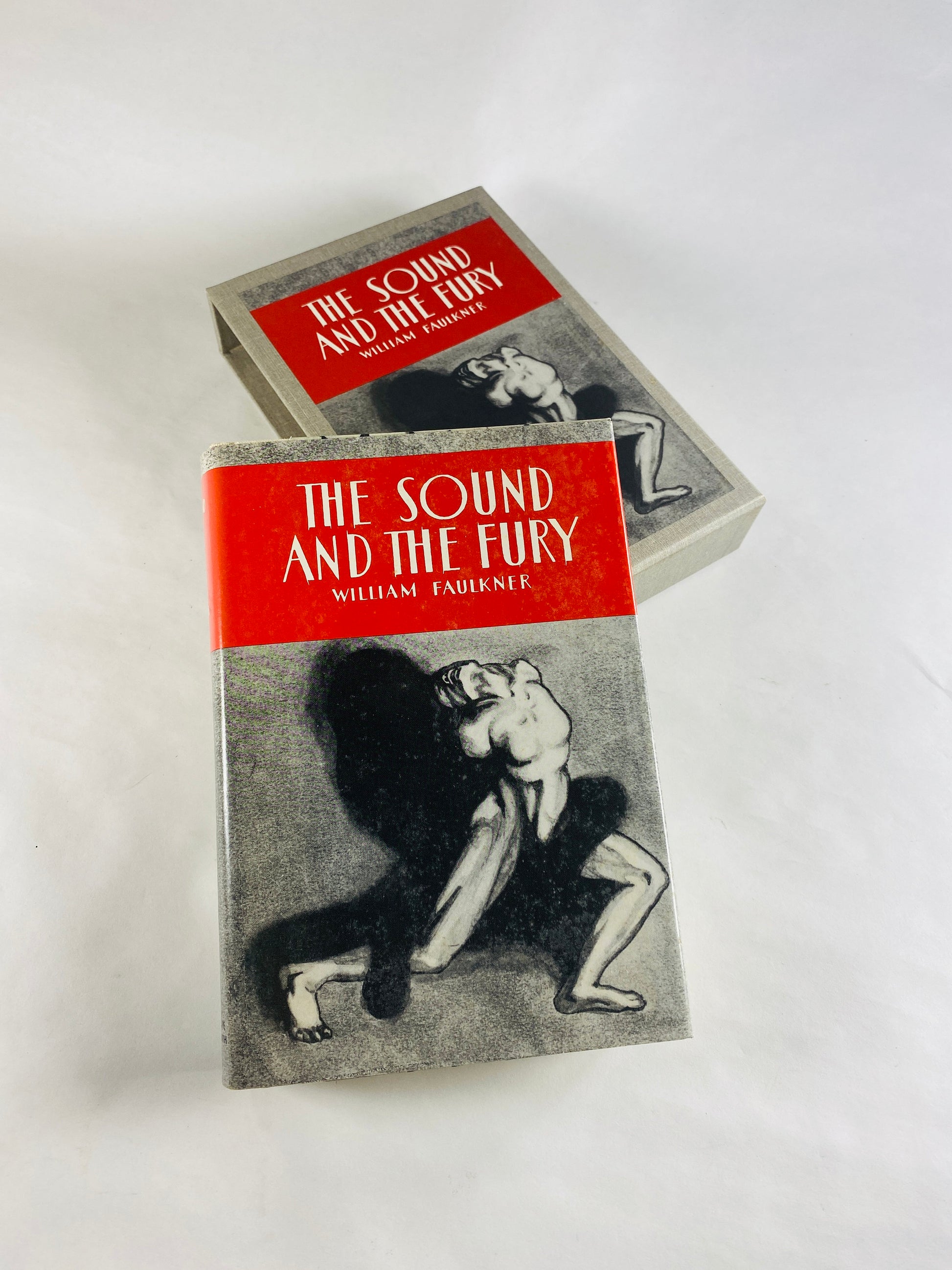 Sound and the Fury vintage book by William Faulkner Tragedy set in Mississippi about former Southern aristocrats and loss of reputation 1984