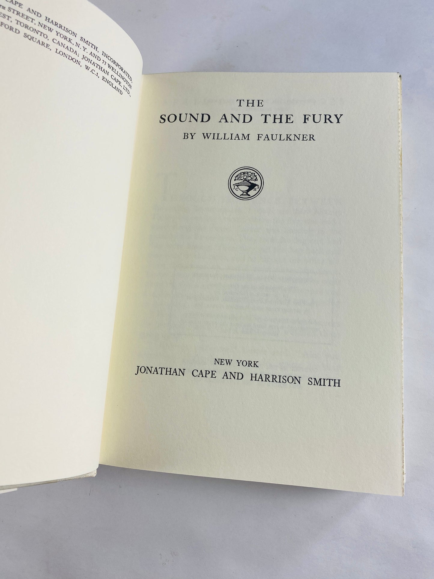 Sound and the Fury vintage book by William Faulkner Tragedy set in Mississippi about former Southern aristocrats and loss of reputation 1984