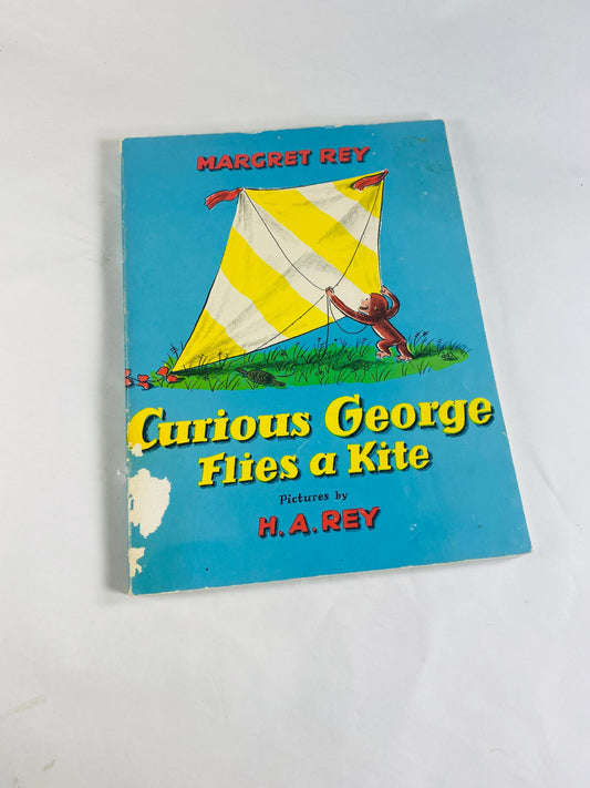 1971 Curious George Flies a Kite Vintage Scholastic paperback book by HA Rey Elementary school reader home decor