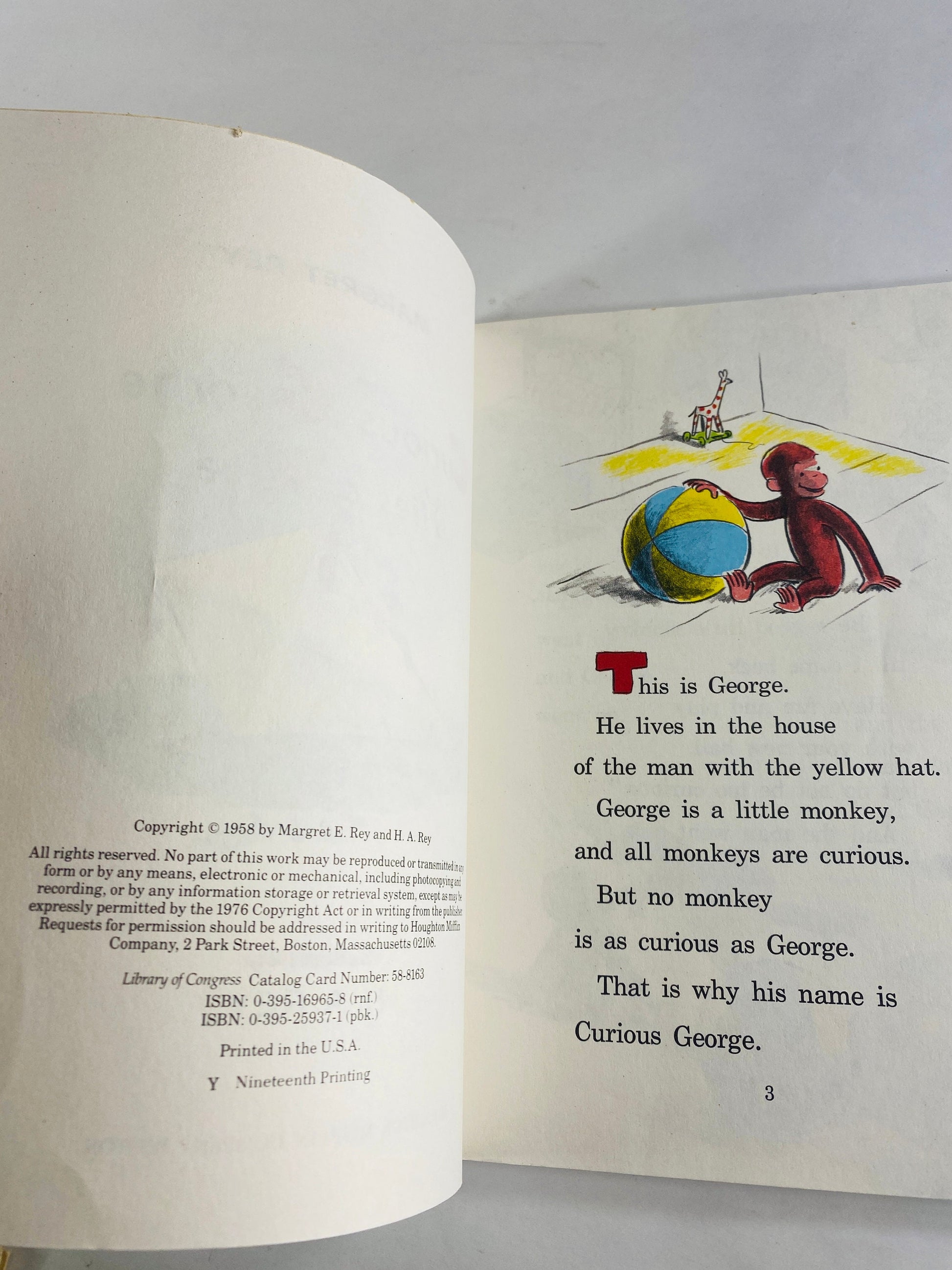1971 Curious George Flies a Kite Vintage Scholastic paperback book by HA Rey Elementary school reader home decor