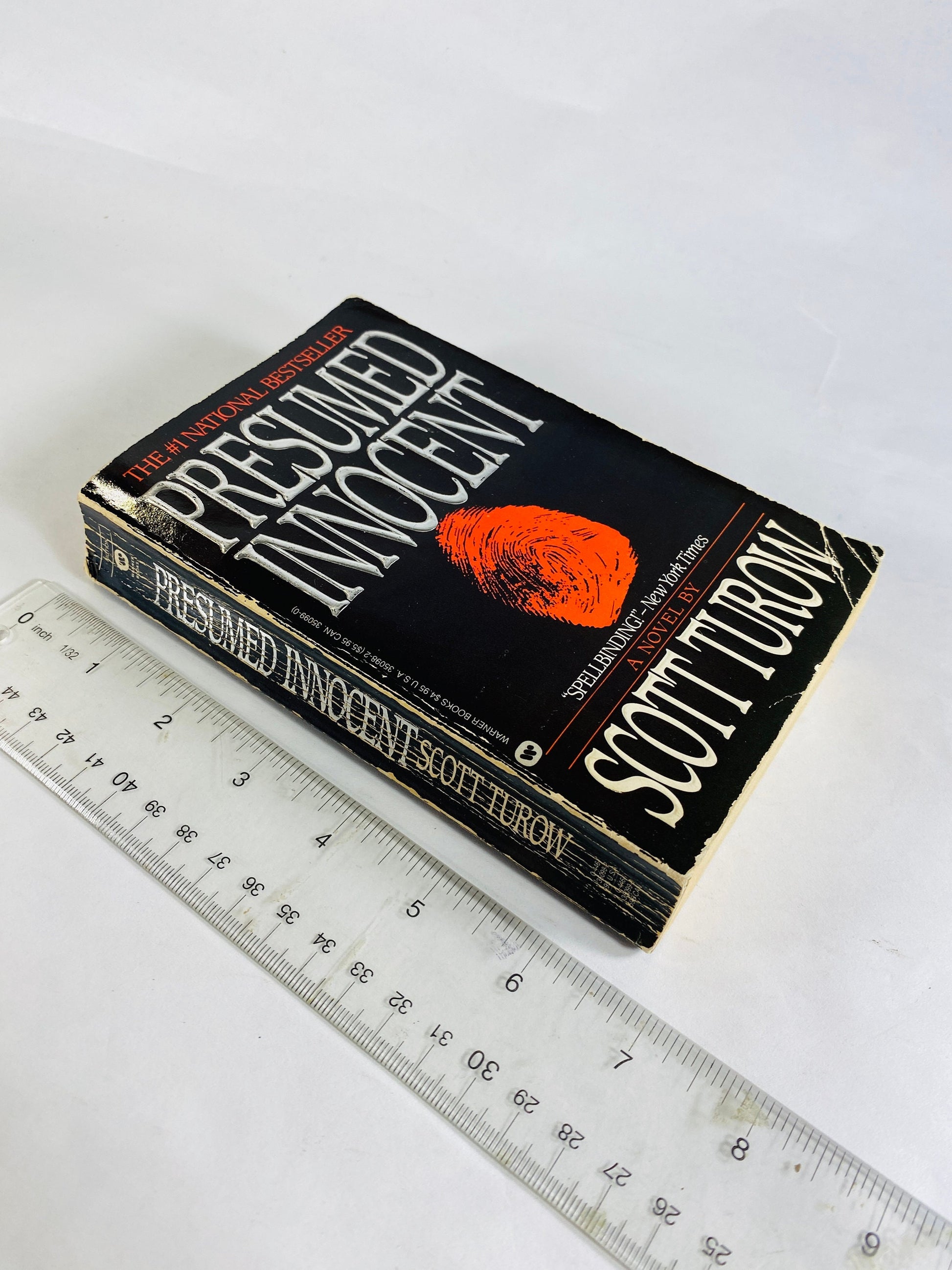 Presumed Innocent vintage paperback book by Scott Turow circa 1987 legal thriller about betrayal, obsession and murder