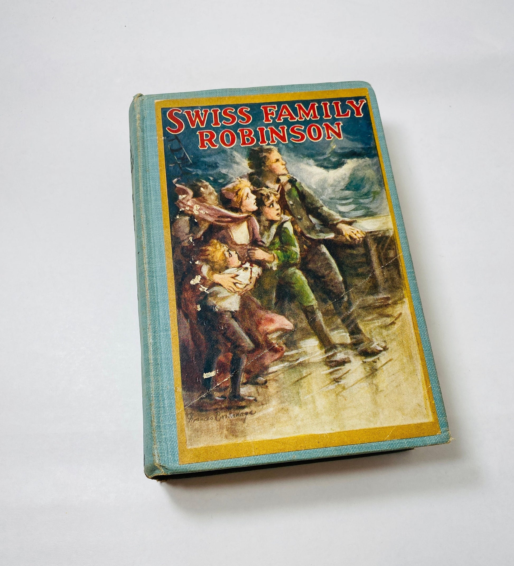 1924 Swiss Family Robinson vintage book by Johann David Wyss about a family who flee Napoleon and ends up shipwrecked on a deserted island