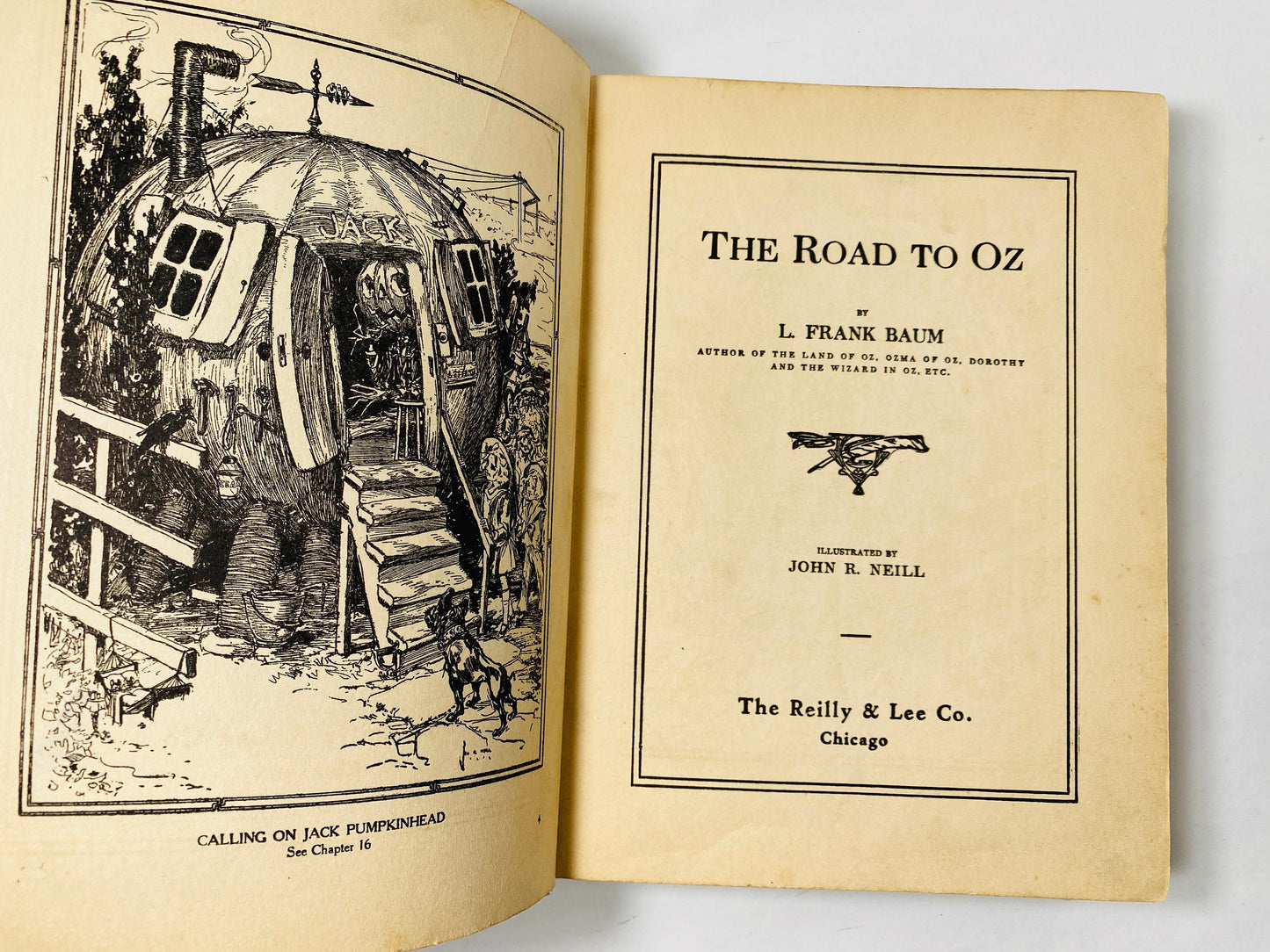 1909 antique Road to Oz vintage book by Frank Baum EARLY EDITION Wizard of Oz series adventure and love Reilly & Lee John R Neill