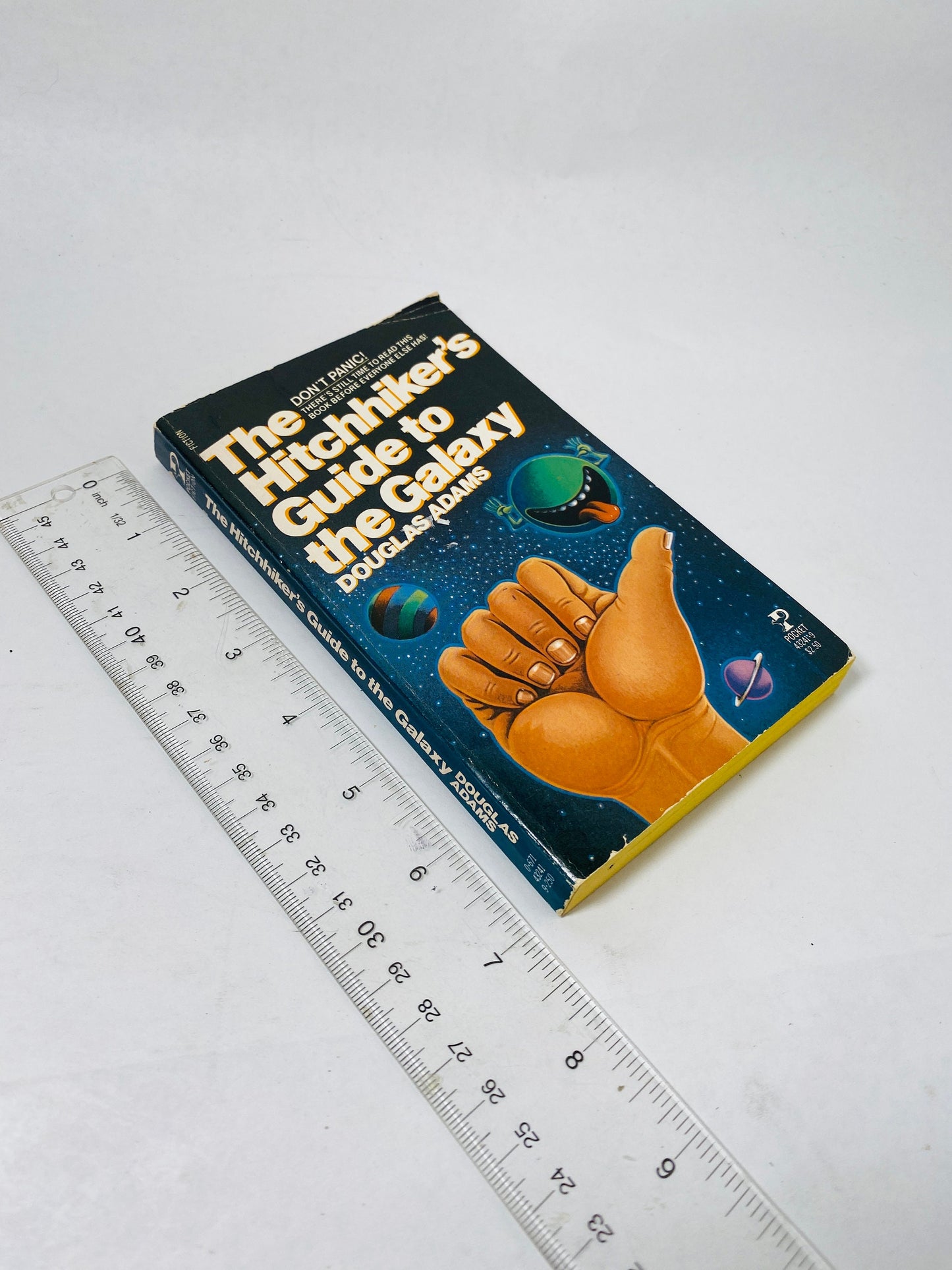 Hitchhiker's Guide to the Galaxy. Vintage Douglas Adams paperback book circa 1981. FIRST POCKET printing.