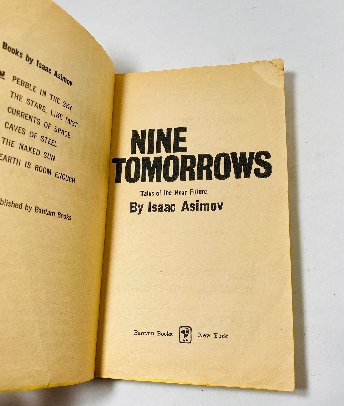 Nine Tomorrows vintage paperback book by Issac Asimov circa 1959 Bantam science fiction Pulp Short Stories Multivac machine interplanetary