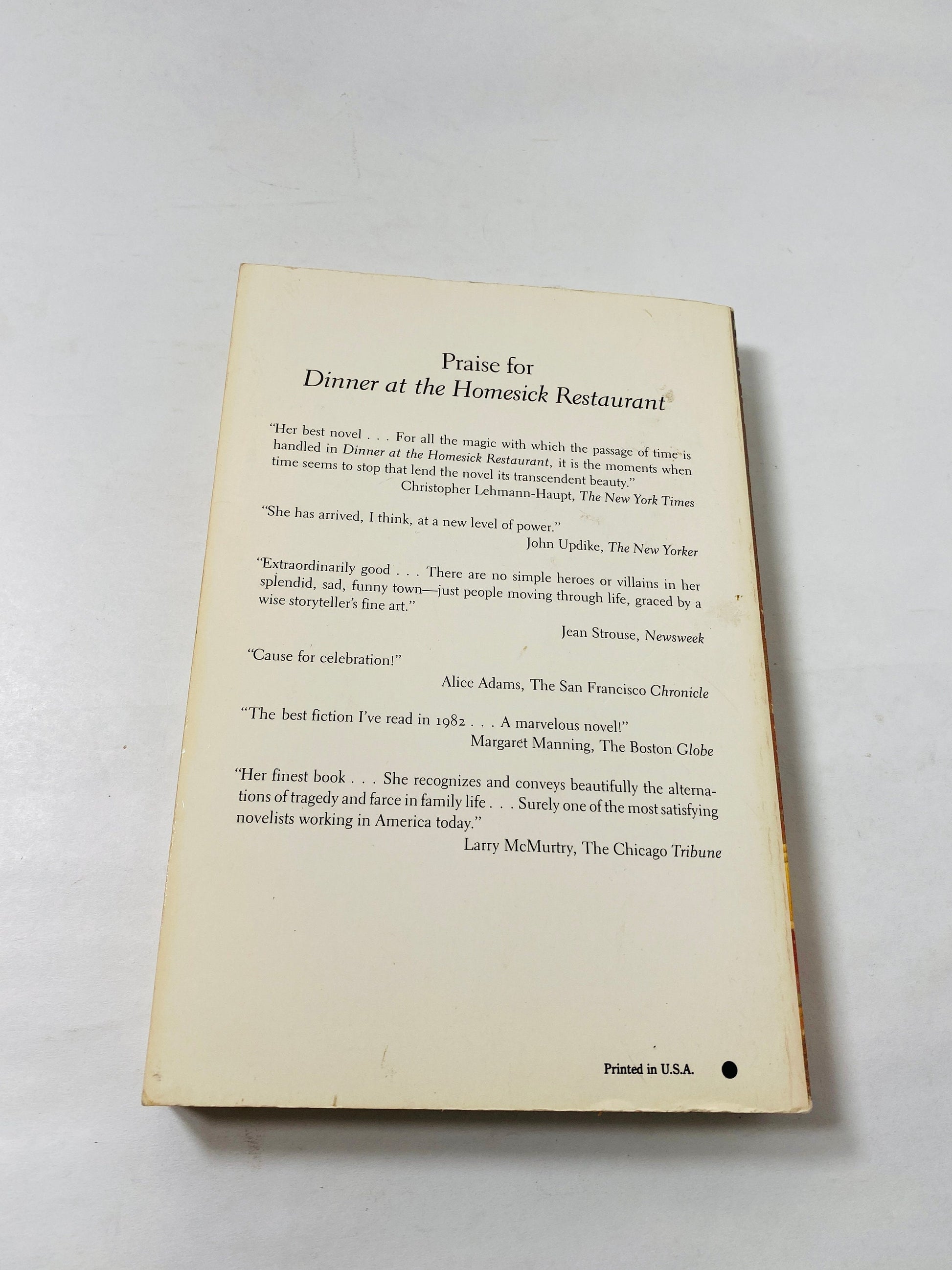 1985 Accidental Tourist vintage paperback book by Anne Tyler about mourning a murdered son and a marriage lost in grief