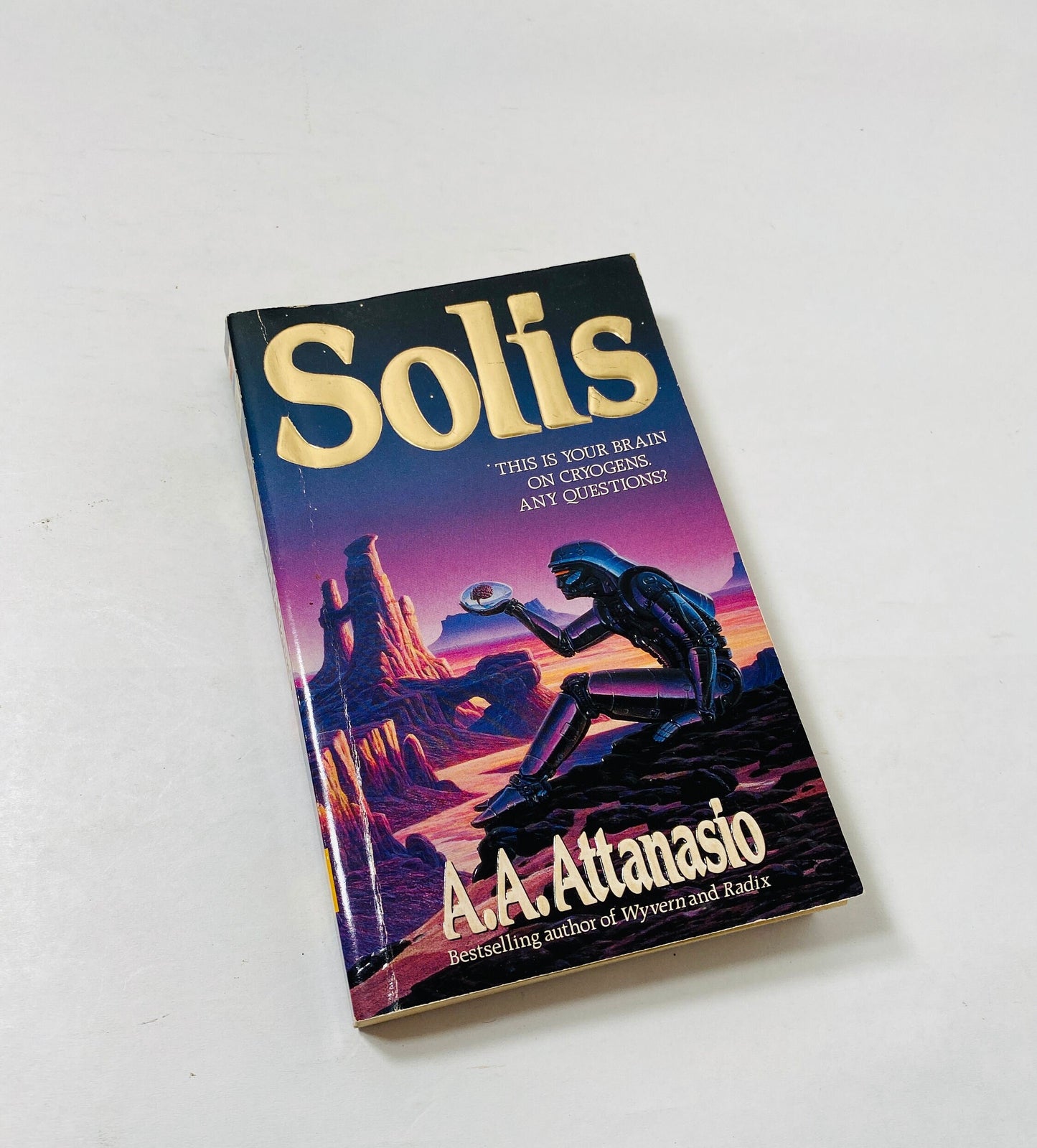 Solis vintage FIRST printing paperback book by AA Attanasio circa 1995 about waking up 1000 years after having the brain frozen. Scifi