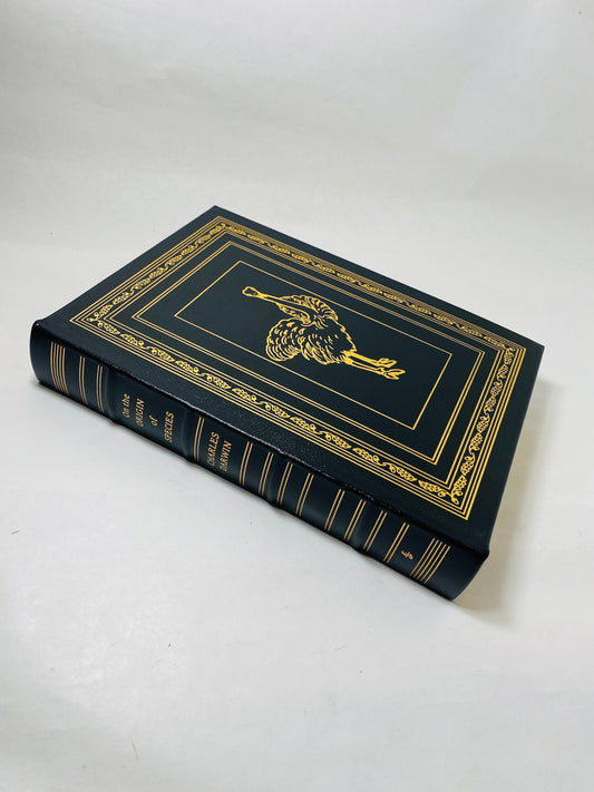 Charles Darwin's Origin of Species Easton Press vintage book Beautiful black and gold leather bookshelf decor Evolution outdoors nature gift