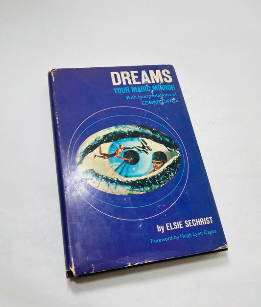 Vintage Magic Mirror Dreams by Elsie Sechrist, circa 1968. Explores dream interpretation and symbolism for self-understanding and spiritual growth. A fascinating read for collectors of metaphysical and psychological literature.