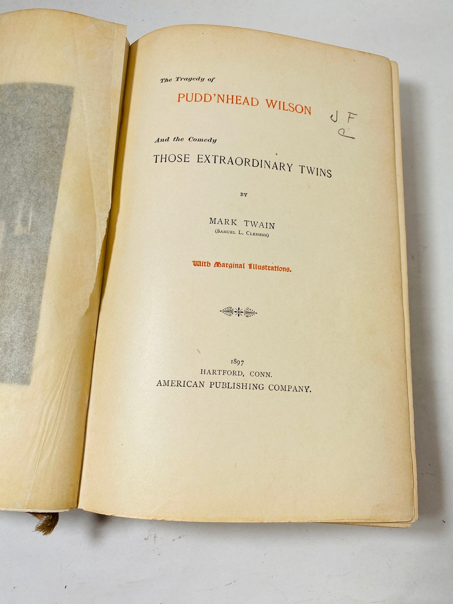 Tragedy of Pudd'nhead FIRST EDITION book by Mark Twain circa 1894 Extraordinary Twins brown embossed gold cover Former Library Book