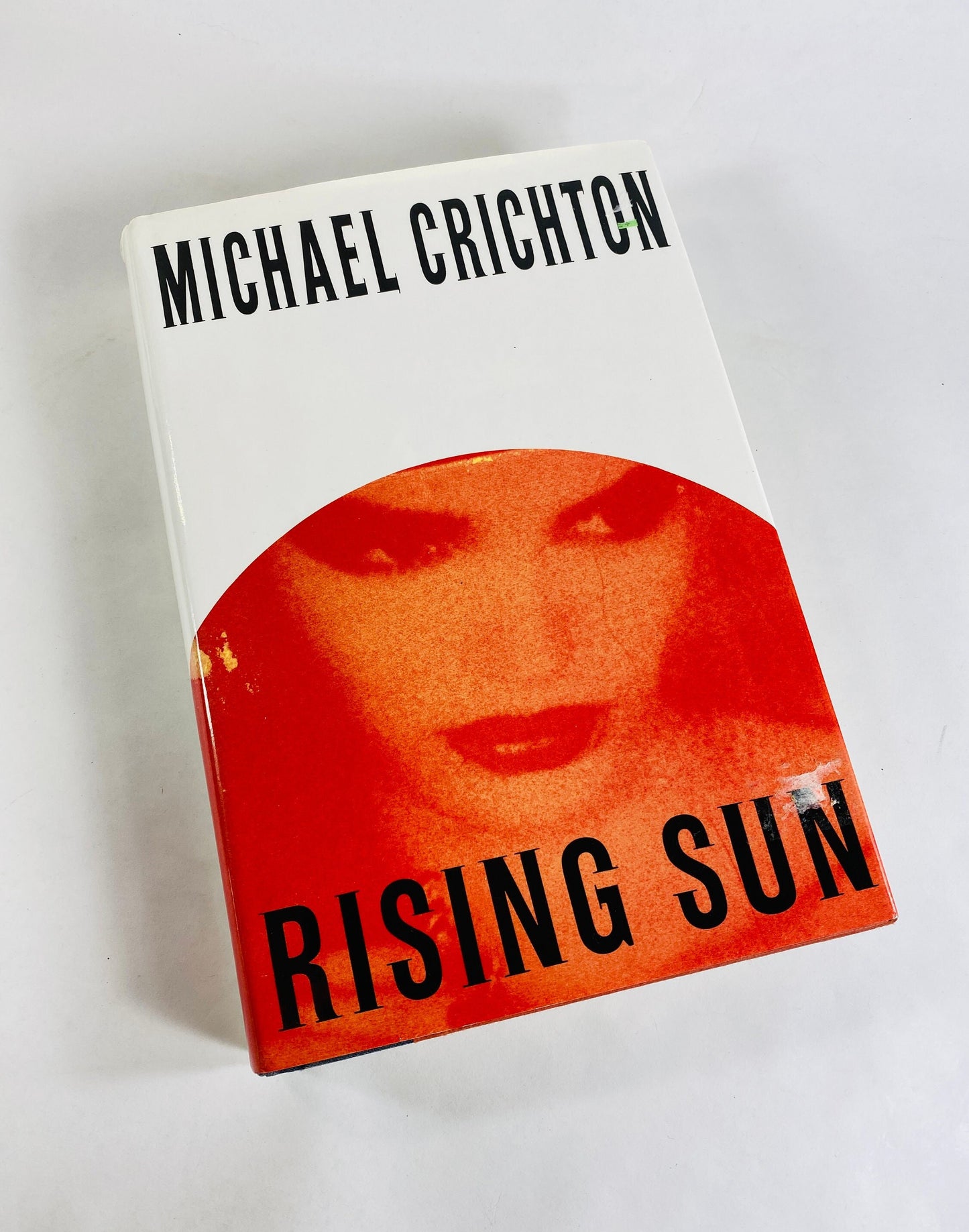 Rising Sun by Michael Crichton vintage book circa 1992 set in Japan where business moguls compete for control of the electronics industry.