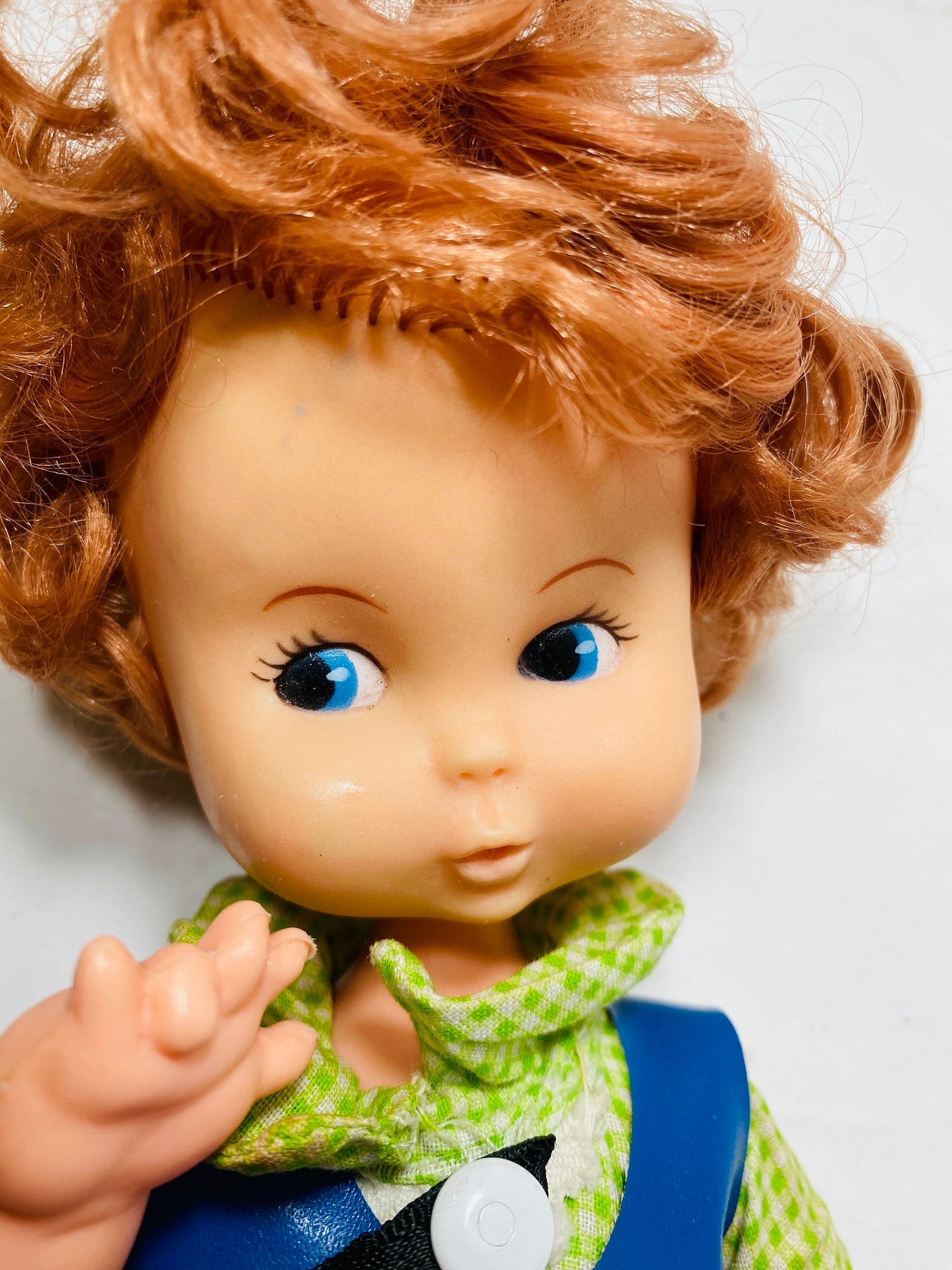 Vintage 1968 9.5" doll reminicent of Shirley Temple with original dress! Collectible with red hair Hard Plastic body Vinyl clothing Nursery