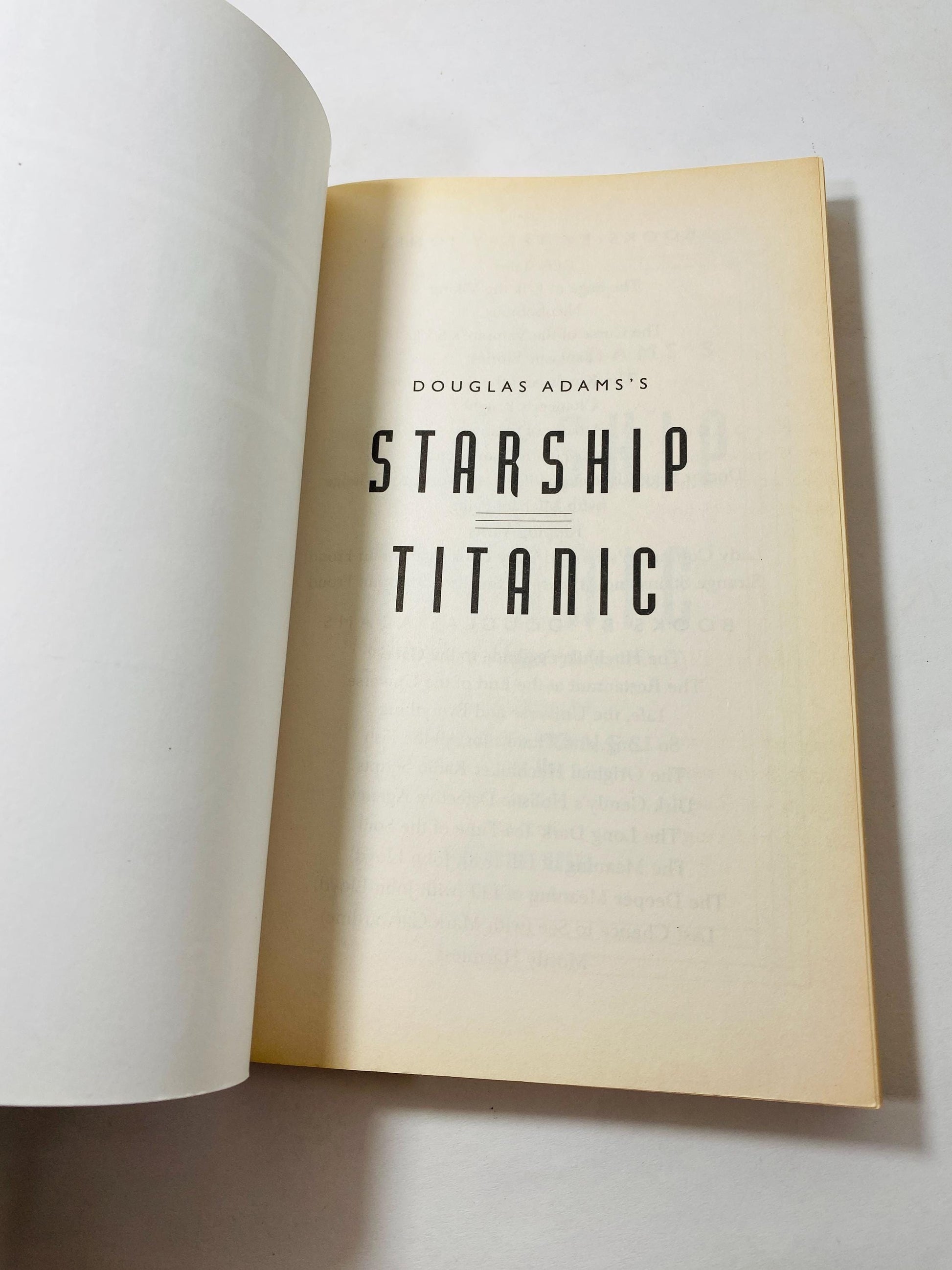 Douglas Adams Starship Titanic vintage paperback book circa 1997. Monty Python. science fiction. Hitchhiker's Guide to the Galaxy.