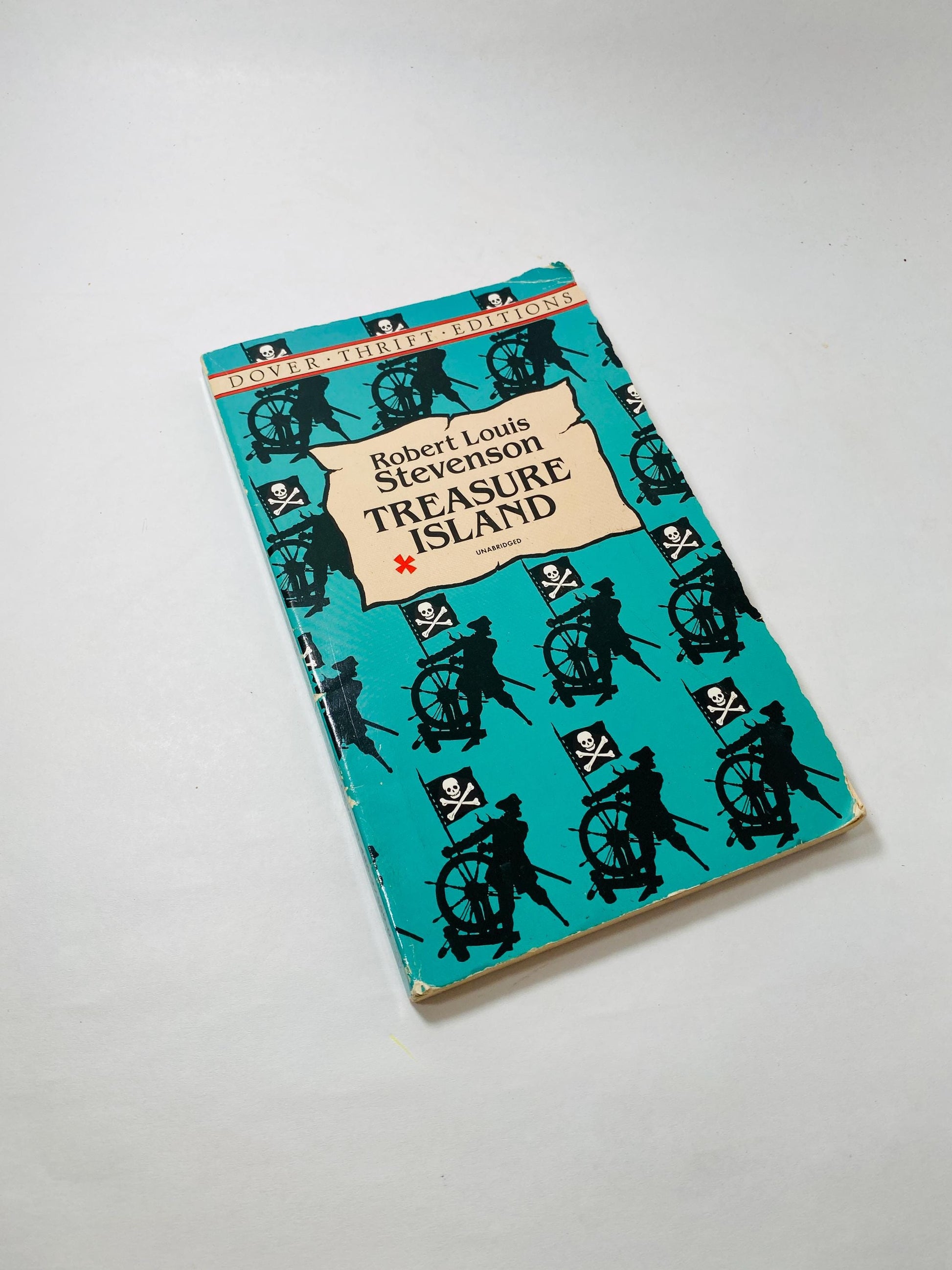 Treasure Island by Robert Louis Stevenson Vintage paperback book bookshelf decor Children's adventure stories Christmas stocking stuffer